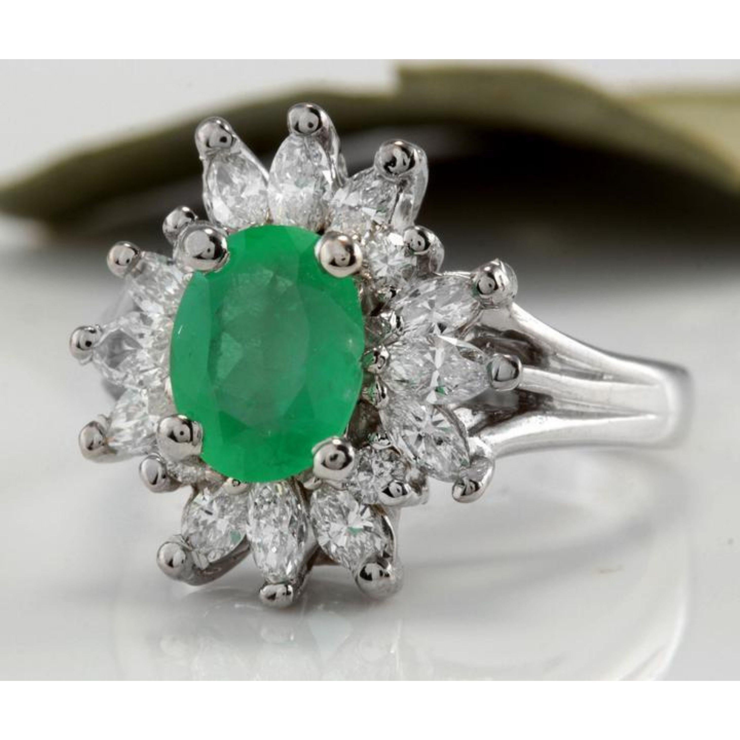 2.65 Carats Natural Colombian Emerald and Diamond 14K Solid White Gold Ring

Total Natural Green Emerald Weight is: 1.40 Carats (transparent)

Emerald Measures: 8.44 x 6.62mm

Natural Round & Marquise Diamonds Weight: 1.25 Carats (color G-H /