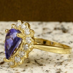 2.65 Carat Natural Splendid Tanzanite and Diamond 14K Solid Yellow Gold Ring