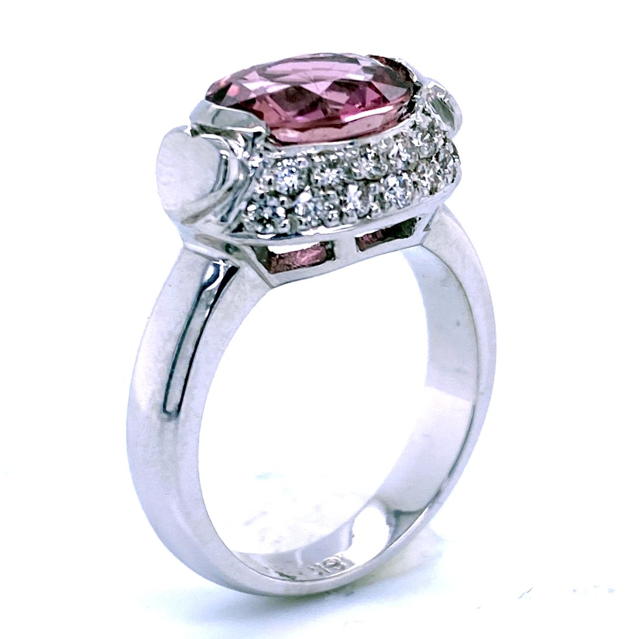 Contemporary 2.65 Carat Oval Pink Tourmaline Pave Set 0.49 Carat Diamond Engagement Ring For Sale