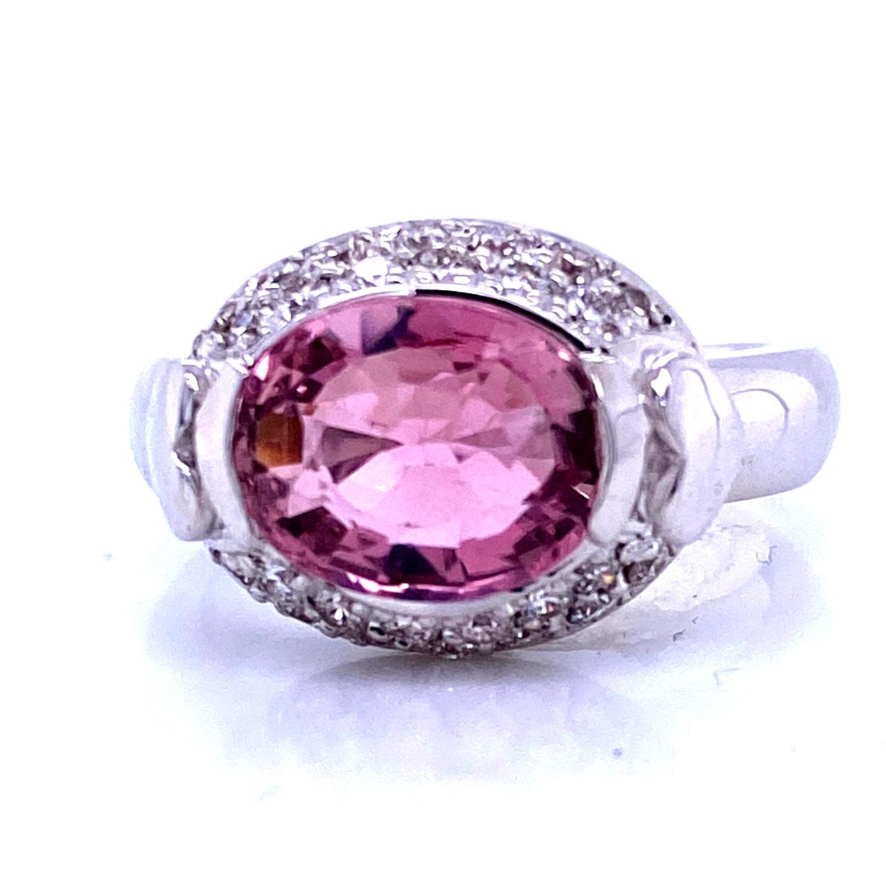 Oval Cut 2.65 Carat Oval Pink Tourmaline Pave Set 0.49 Carat Diamond Engagement Ring For Sale