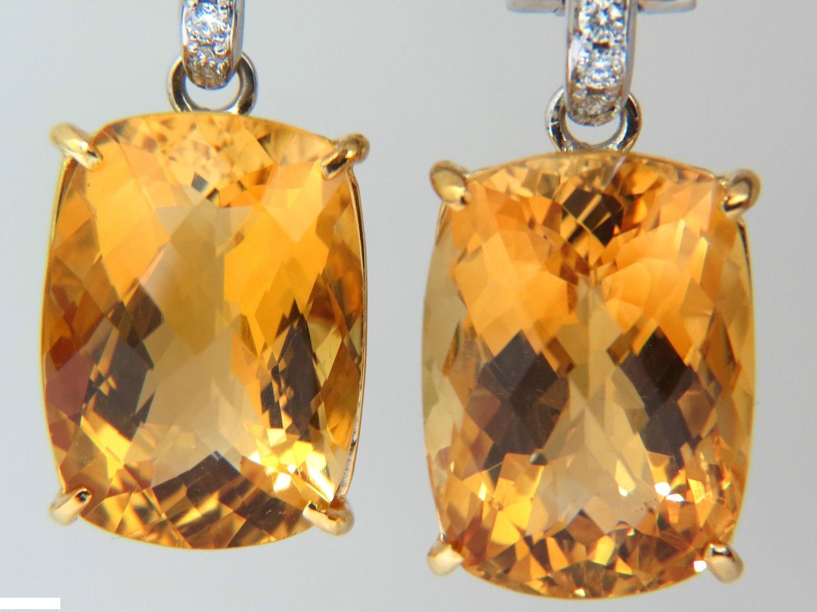 25.00ct. Natural Citrine

Rose cut, Full brilliance

Clean Clarity

17.3 X 12.6mm

1.50ct. diamonds

G-color, Vs-2 clarity. 

18kt. white gold

1.6 inch long

18.8 grams.

Earrings are gorgeous made

Omega clips

$9500 appraisal will accompany