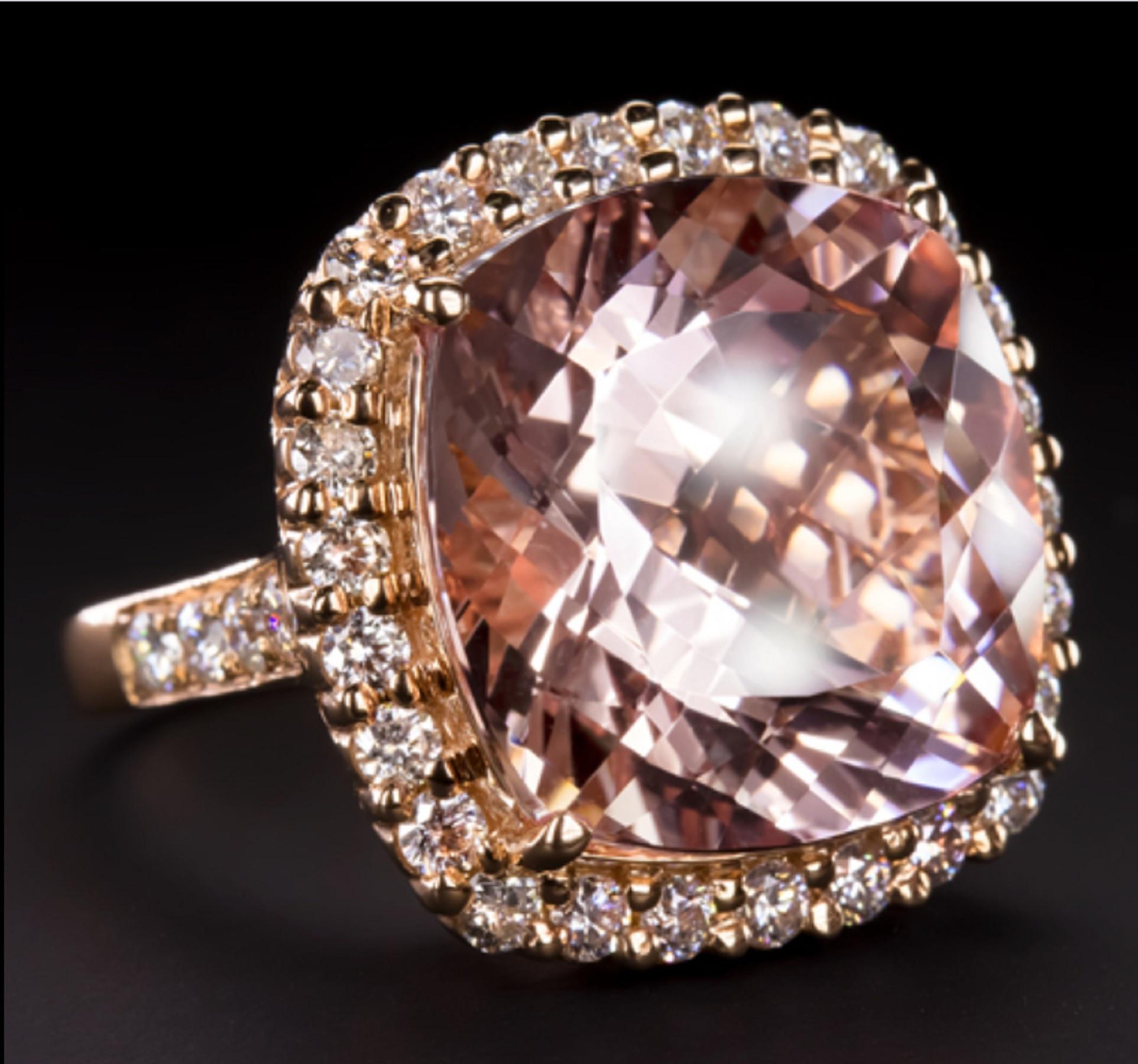 An exquisite and impressive ring composed by a huge pink morganite and a double halo of very pure diamonds all set in 18 carats pink gold.