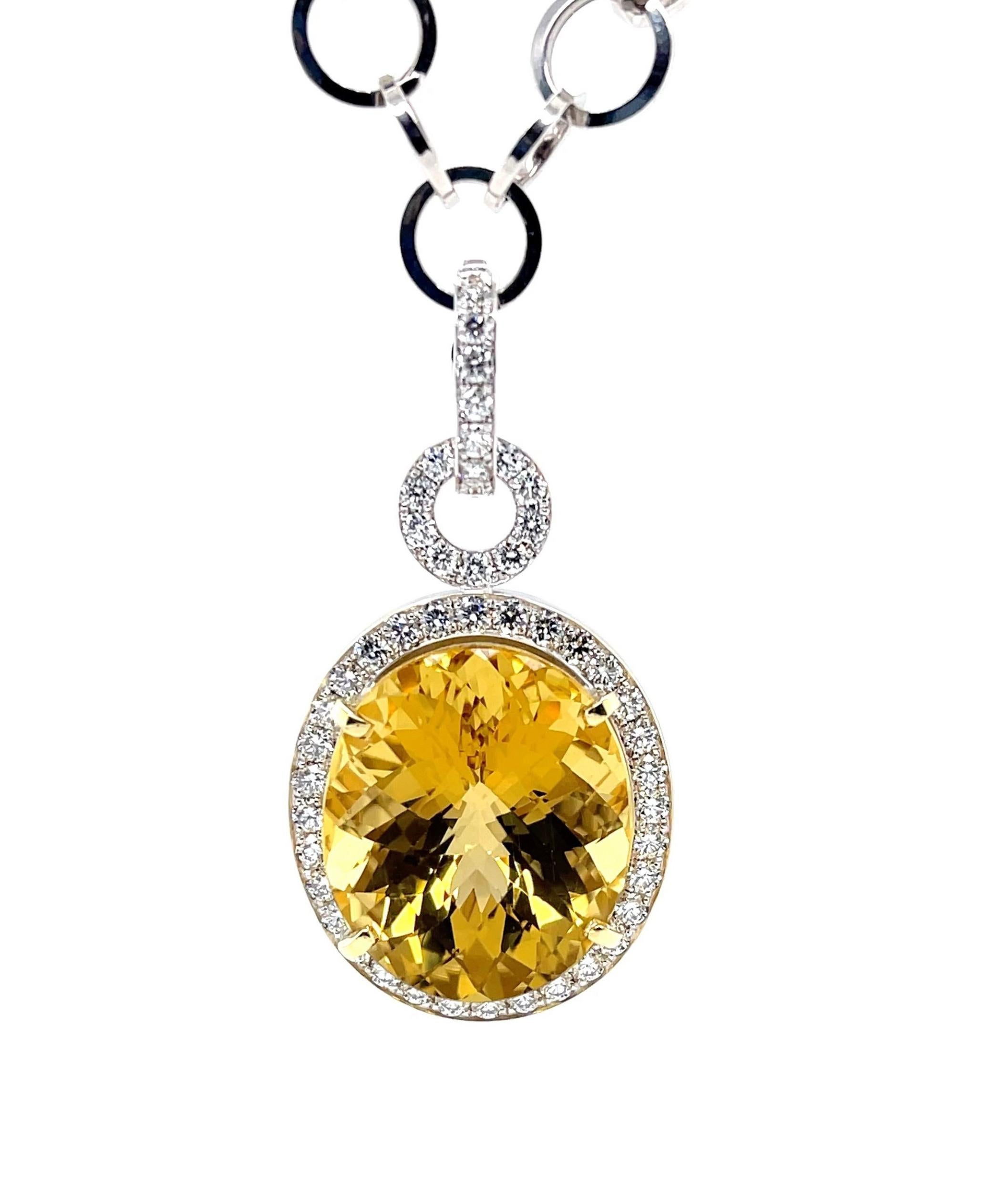 This gorgeous statement necklace features an exquisite 26.53 carat oval golden beryl with spectacular color! While the beryl mineral family includes calm blue aquamarine and gentle pink morganite, golden beryl is like crystalline sunshine - warm,