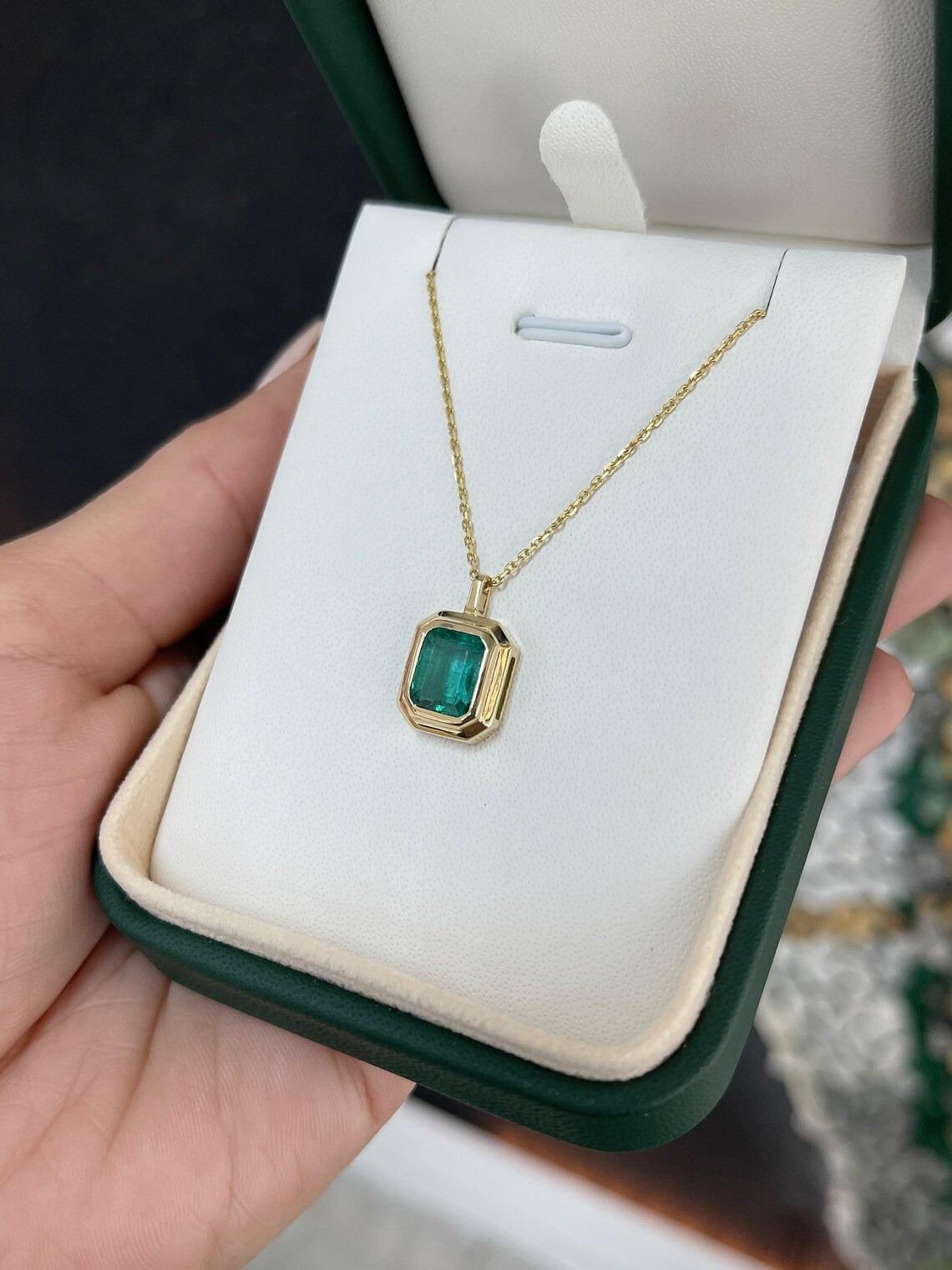 2.65ct 14K Deep Bluish Green Emerald Cut Emerald Double Bezel Solitaire Pendant In New Condition For Sale In Jupiter, FL
