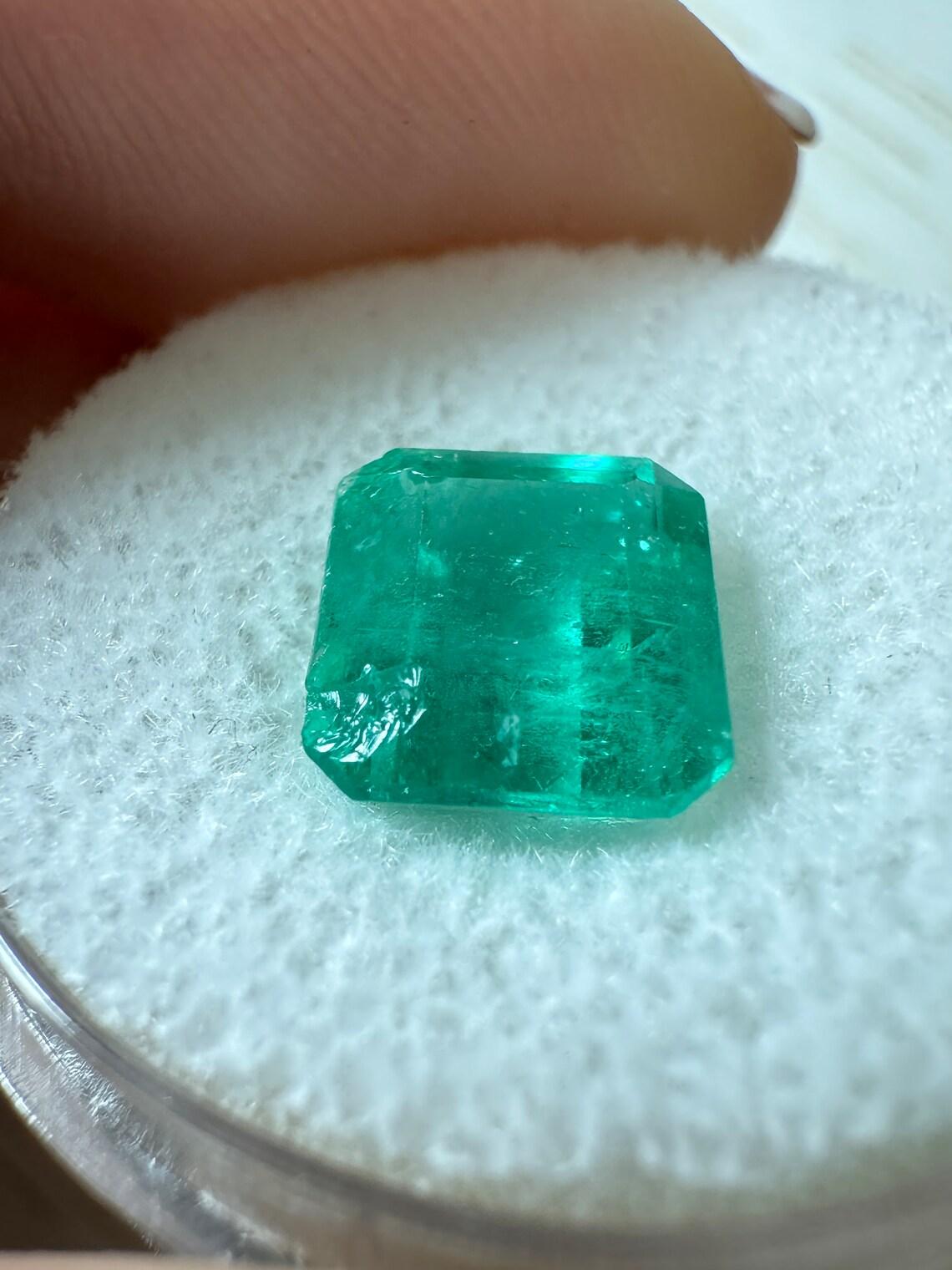 Stone: Emerald
Weight: 2.65-carats
Shape: Asscher Cut
Clarity: Transparent
Luster: Very Good-Good
Color: Medium Green
Measurements: 8.71mm x 7.77mm
Geographic Origin: Colombia
Treatment: Natural, Oiling

Comments: Due to their growth conditions in