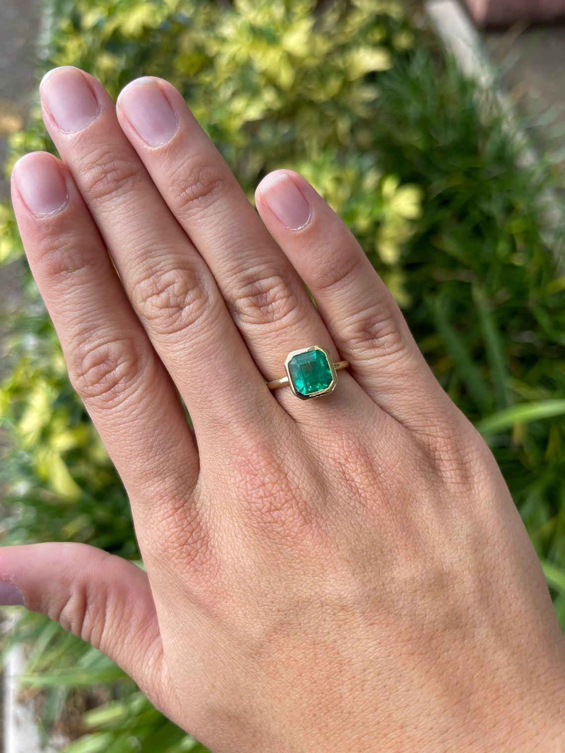 emerald bezel ring