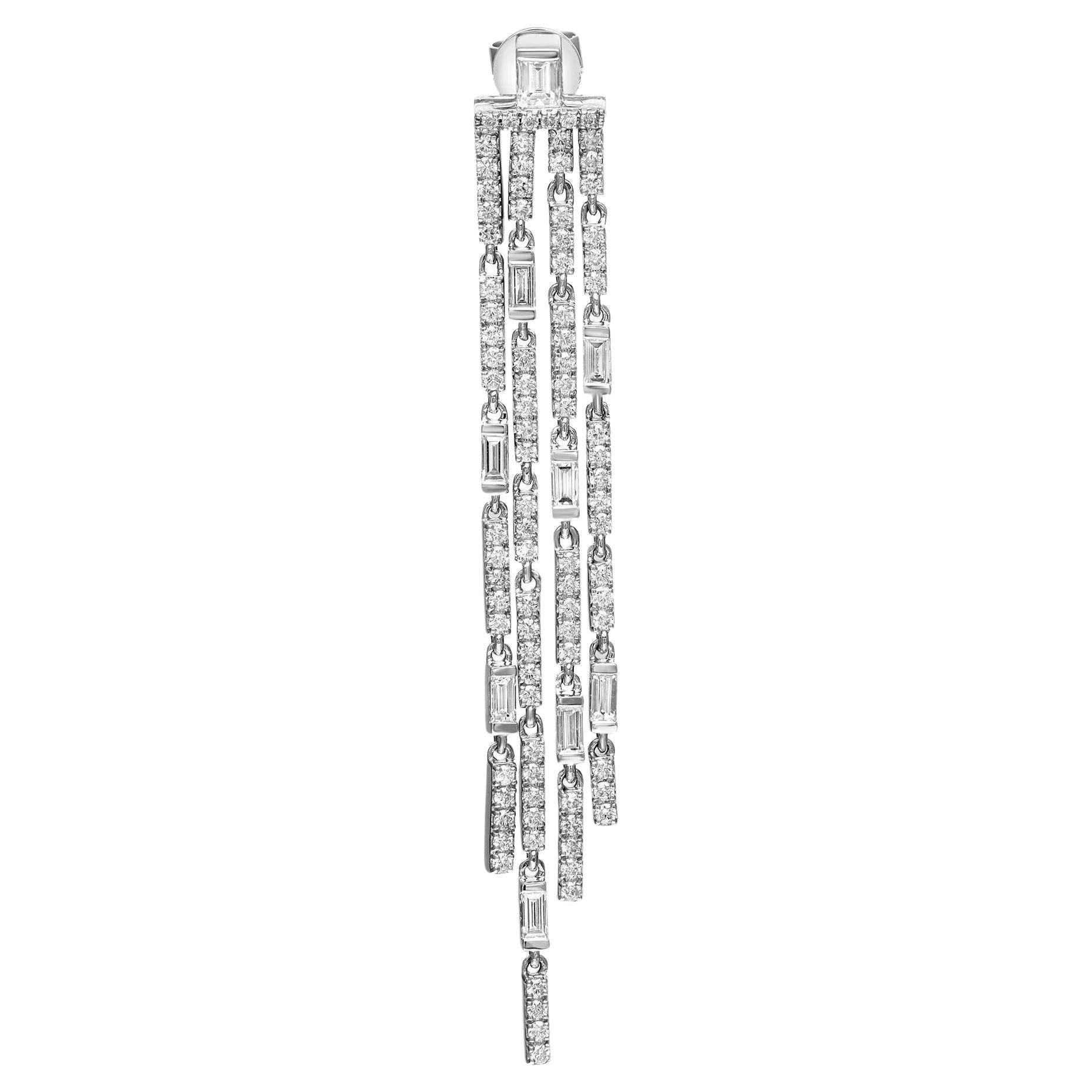 These wonderful pair of chandelier long drop earrings are designed in lustrous 18K white gold studded with baguette and round brilliant cut diamonds. These earrings are studded with a total of 196 diamonds. Total diamond weight: 2.65 carats. Diamond