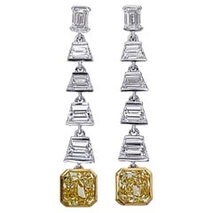 2.66 Carat Cushion Cut Yellow Diamond Earrings in 18 Karat White Gold