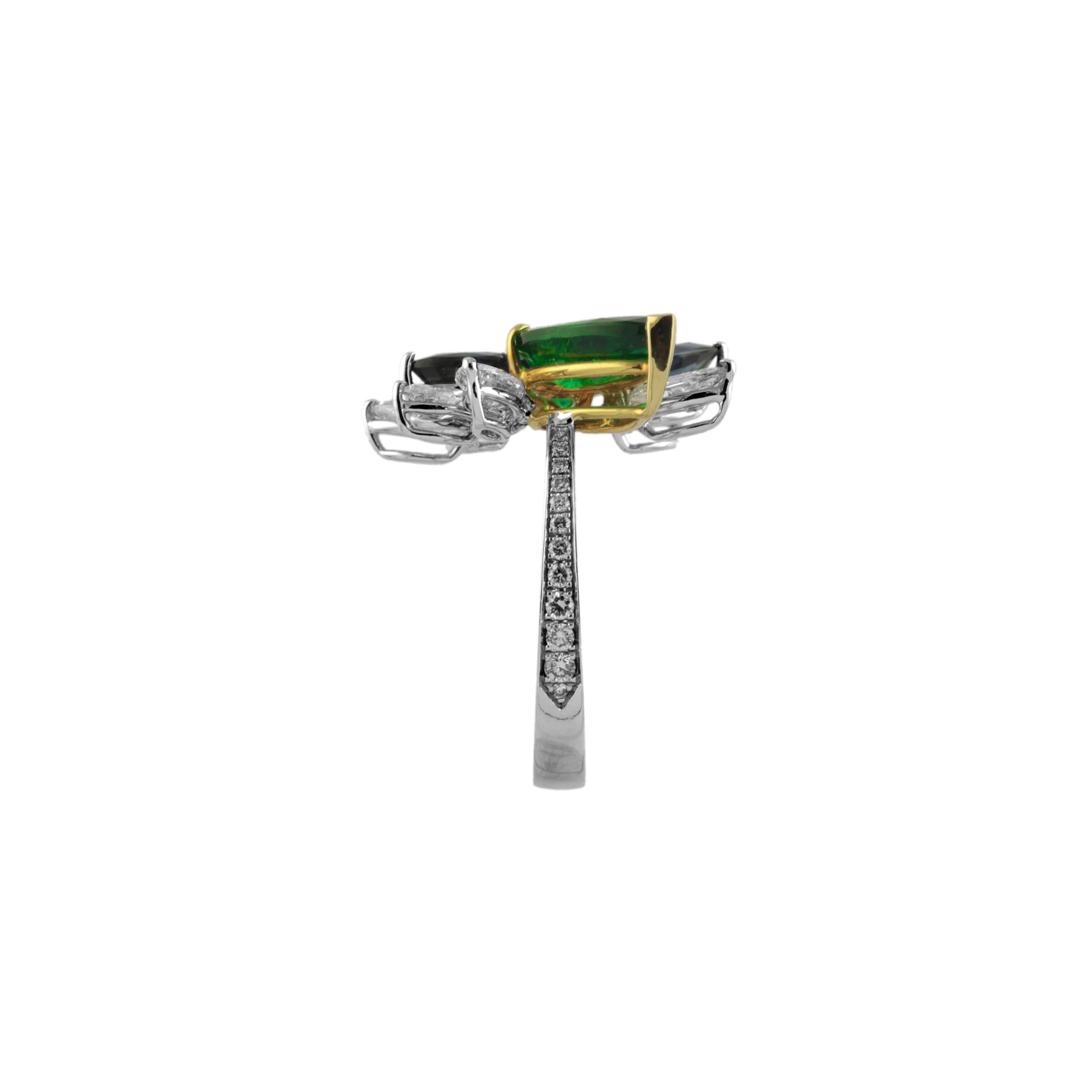Oval Cut 2, 66 Carat Emerald, 1, 66 Sapphire 18 Karat White Gold Ring For Sale