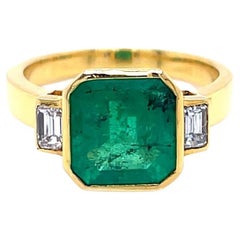 2.66 Carat Emerald and Diamond Three Stone Ring in 18K Yellow Gold