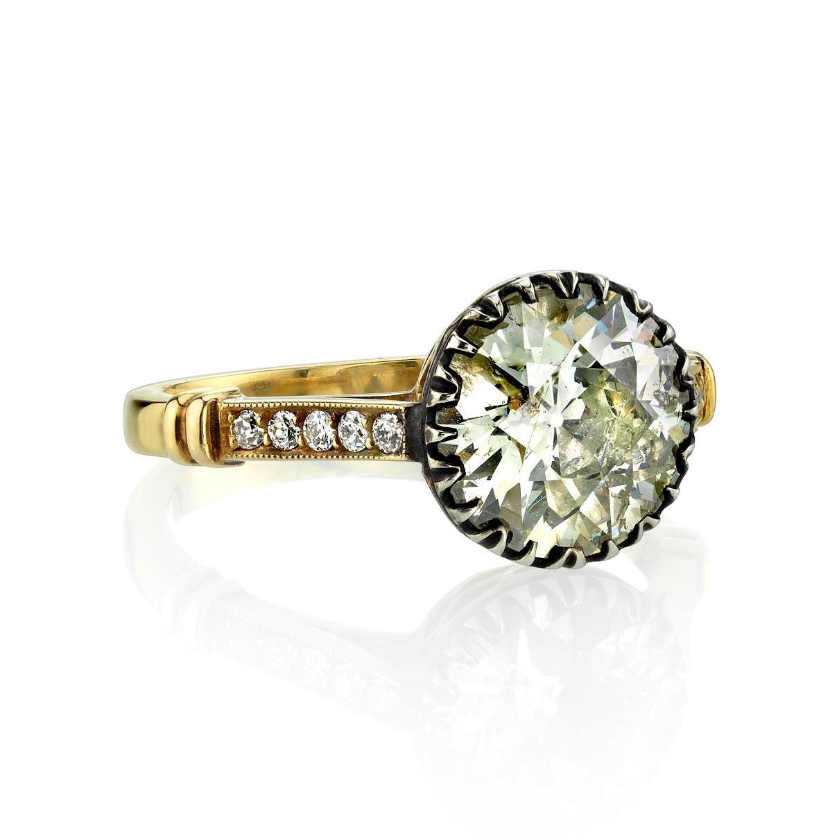 2.66ct J/I1 EGL certified old European cut diamond set in a handcrafted 18K yellow gold and silver mounting. This beautiful ring is Georgian inspired and offers a modern twist. The ring is currently a size 6 and can be sized to fit. 