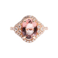 2.66 Carat Oval Morganite and Round Diamond 18 Carat Rose Gold Halo Cluster Ring