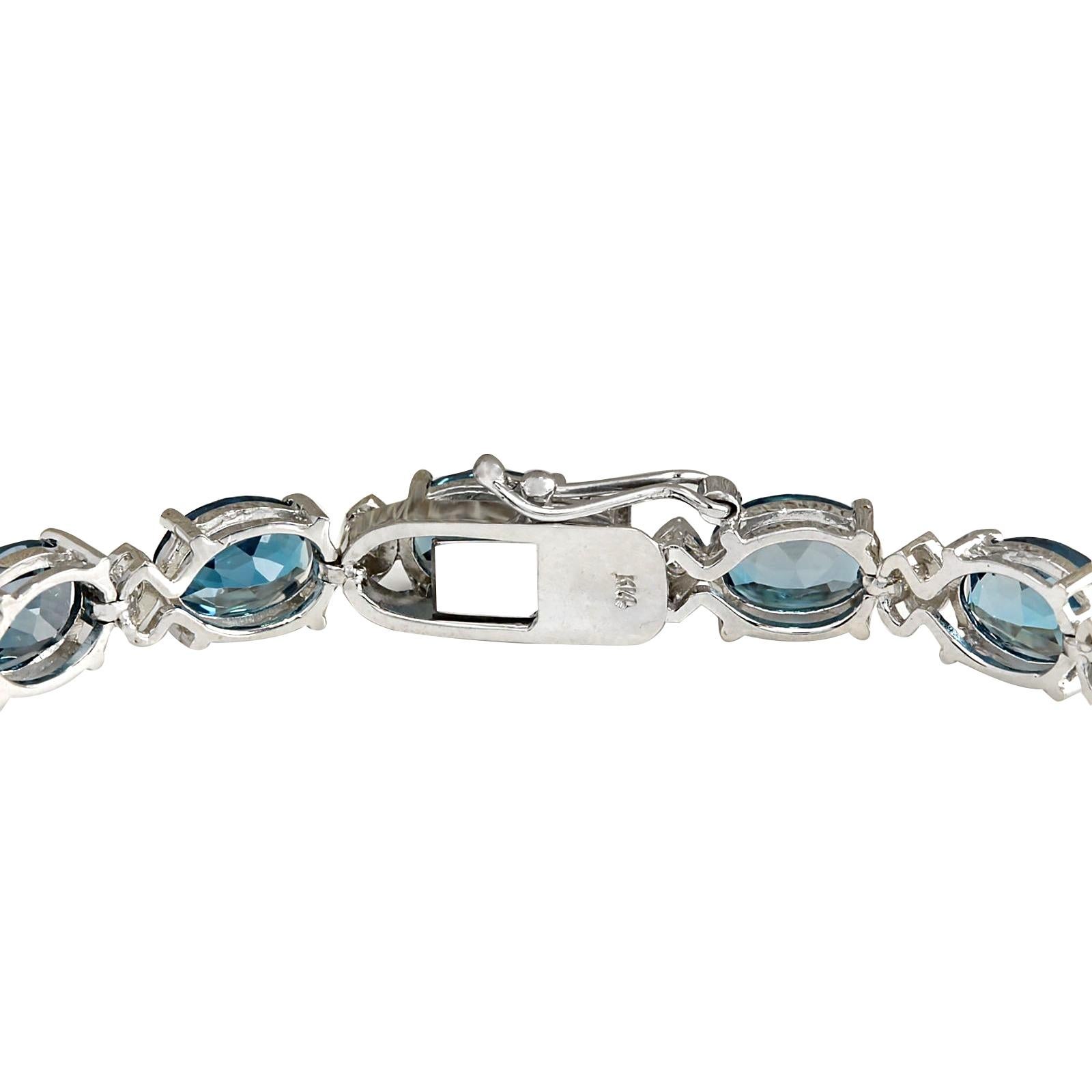 26.60 Carat Natural Topaz 14 Karat White Gold Diamond Bracelet
Stamped: 14K White Gold
Total Bracelet Weight: 13.0 Grams
Bracelet Length: 7 Inches
Bracelet Width: 6.00 mm
Topaz Weight is 26.00 Carat (Measures: 6.00x8.00 mm)
Diamond Weight is 0.60