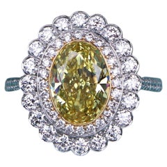 26627 Tiffany Co Enchant Platinum 2.60ct Oval Fancy Vivid Yellow Diamond Ring