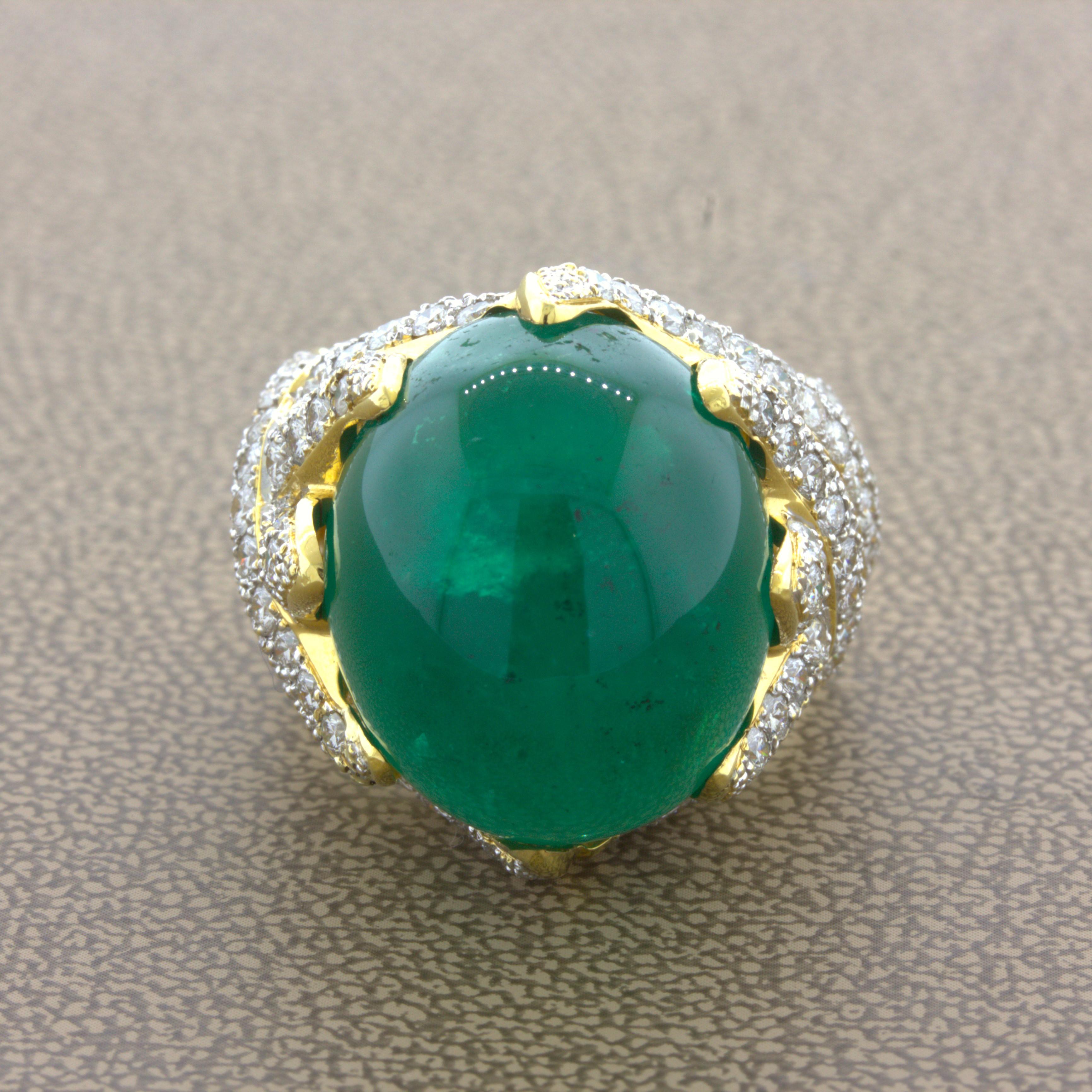26.67 Carat Colombian Emerald Diamond 18K Yellow Gold Cocktail Ring, AGL Certified

A lovely gem vivid green Colombian emerald takes center stage. It has a rich vibrant color and weighs an impressive 26.67 carats. Adding to that, it is certified by