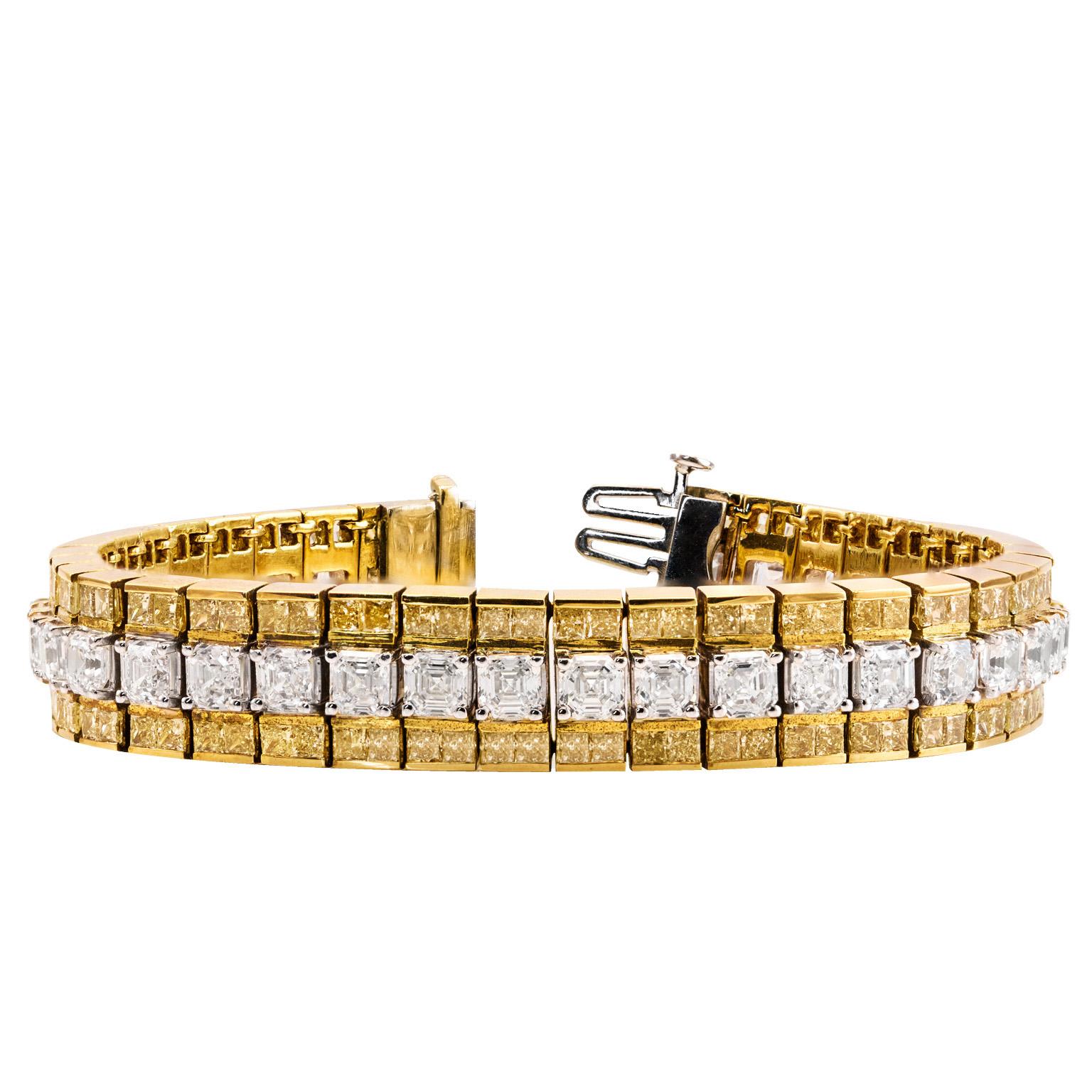 A very bold yet elegant bracelet to add to any jewelry collection. Showcasing three rows of brilliant diamonds; A line of asscher cut diamonds weighing 15.70 carats total take center stage and complimented by princess cut fancy yellow diamonds