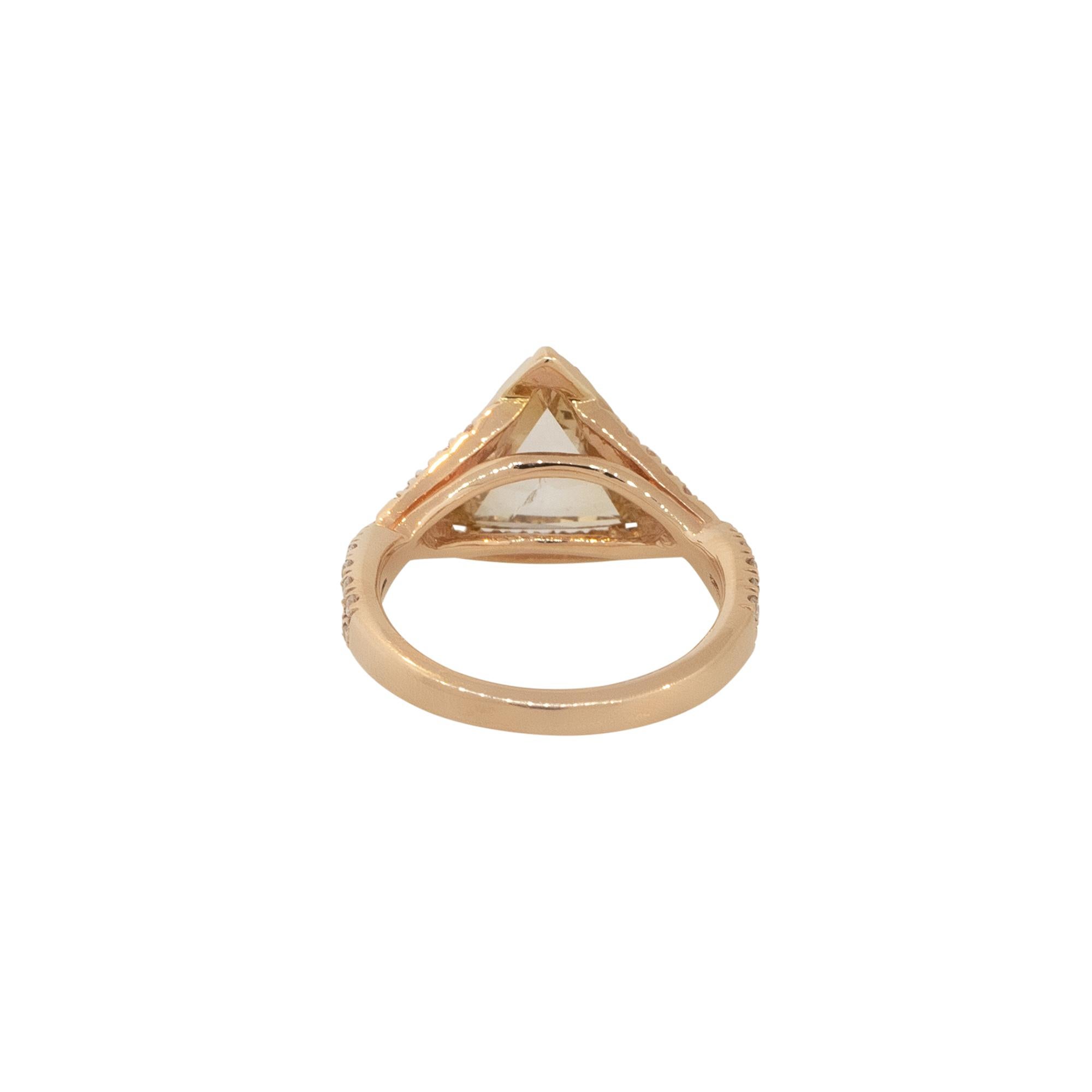 14k Rose Gold 2.67ctw Brown Triangle Diamond Halo Twisted Engagement Ring

Material: 14k Rose Gold
Center Diamond Details: Approx. 2.07ctw Triangle Cut Diamond. Center Diamond is J/K in color and SI2 in clarity
Mounting Details: Approx. 0.60ctw of