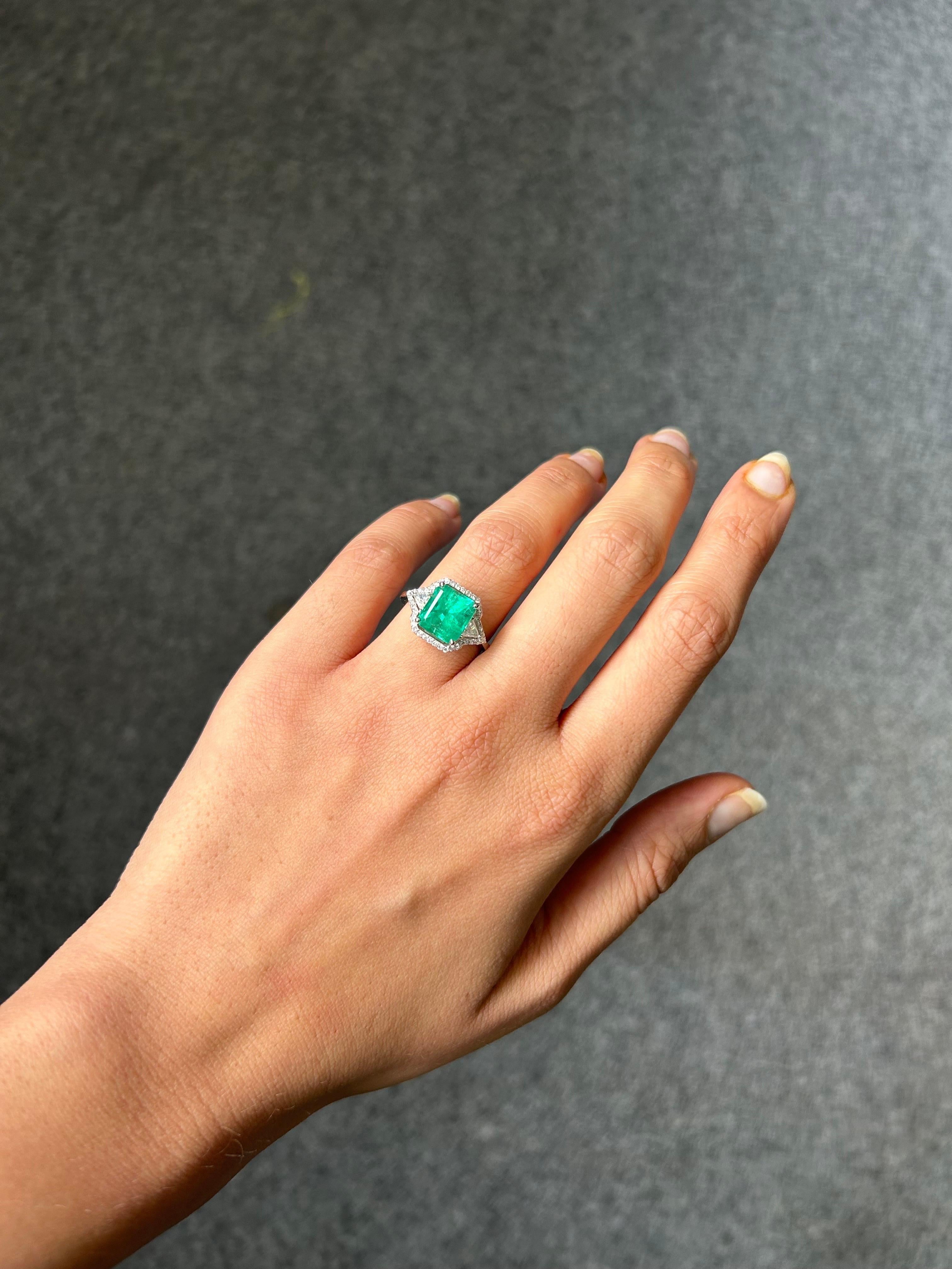 Modern 2.67 Carat Colombian Emerald and Diamond Three-Stone Engagement Ring