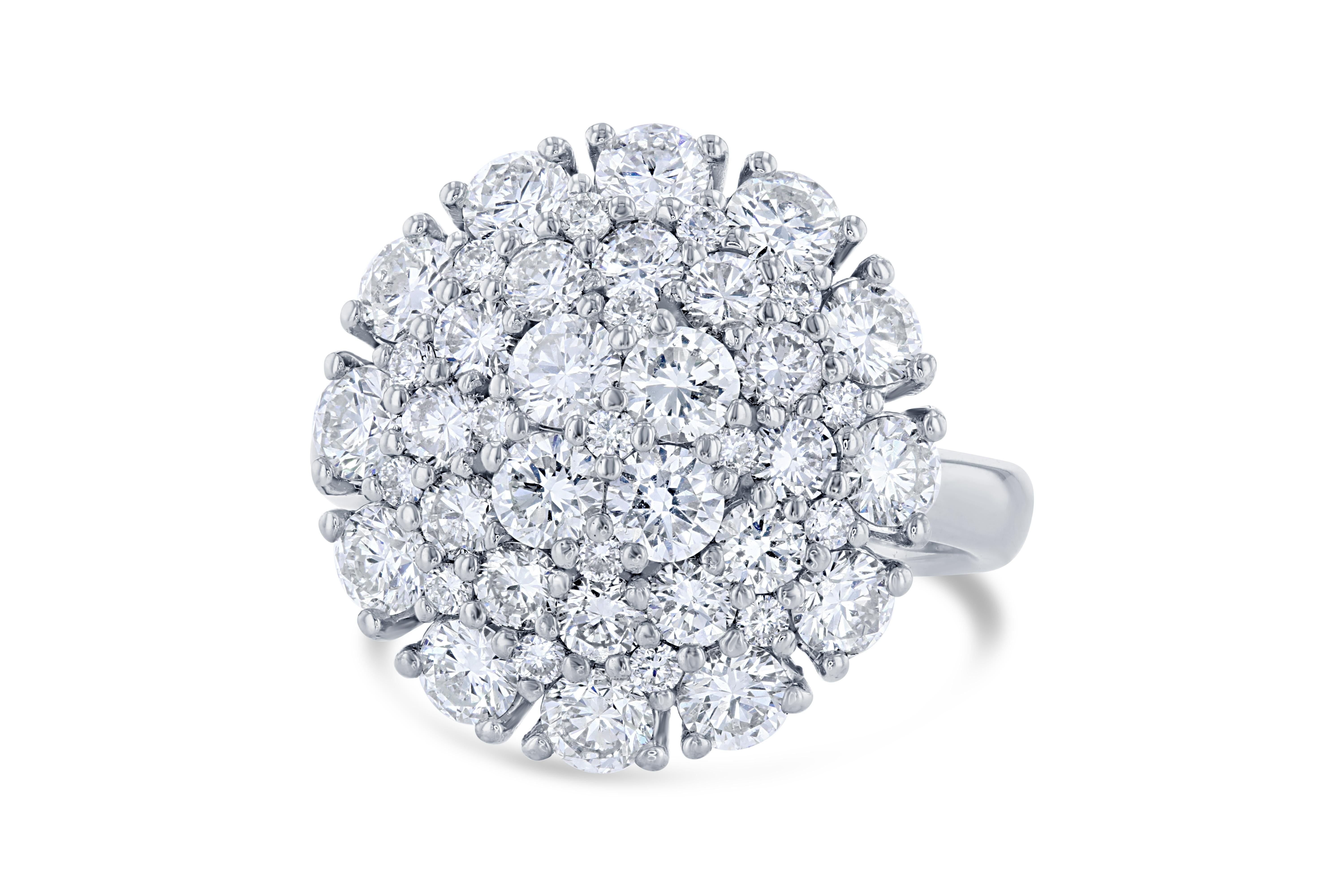 Magnificent and nothing short of a Statement! 

This cocktail ring has 45 Round Cut Brilliant Diamonds that weigh 2.67 Carats. The Clarity and Color of the Diamonds are VS-F. 

It is beautifully set in 14 Karat White Gold and weighs approximately