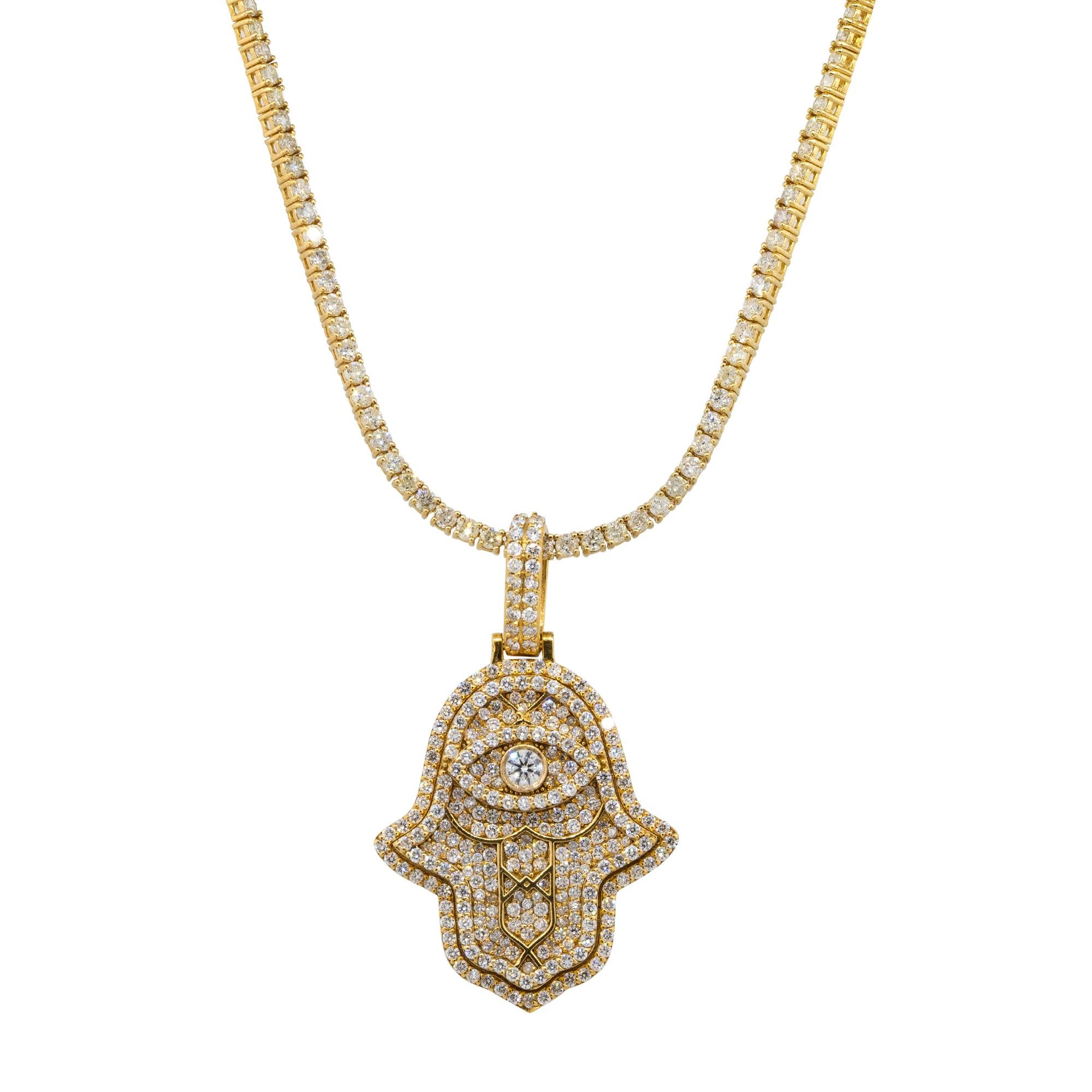 Disclaimer: This listing is for the pendant ONLY
Material: 14k Yellow Gold
Diamond Details: Approx. 2.67ctw of round cut Diamonds. Diamonds are G/H in color and SI/VS in clarity, 281 stones.  
Pendant Measurements: 28mm x 9.20mm x 46.50mm
Total