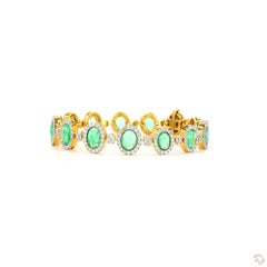 Pulsera de oro esmeralda con un diamante redondo de talla brillante de 2,67 quilates