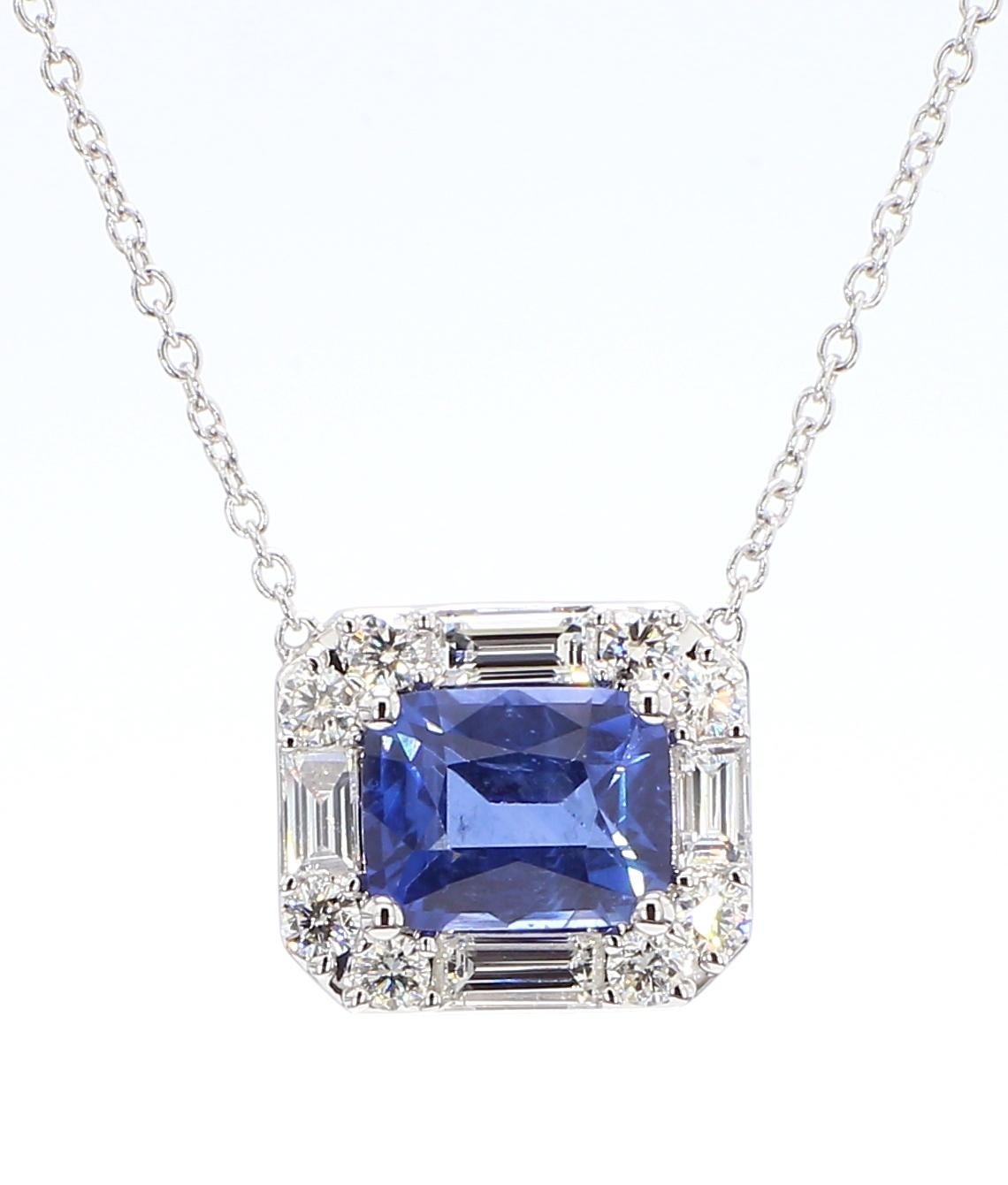 This 2.67 Carat *Sapphire Cushion Cut* GIA Certified Pendant adorned by a halo of baguette and round white diamonds is a testament to fine craftsmanship and timeless design. Perfect for those who appreciate the beauty of natural diamonds, this