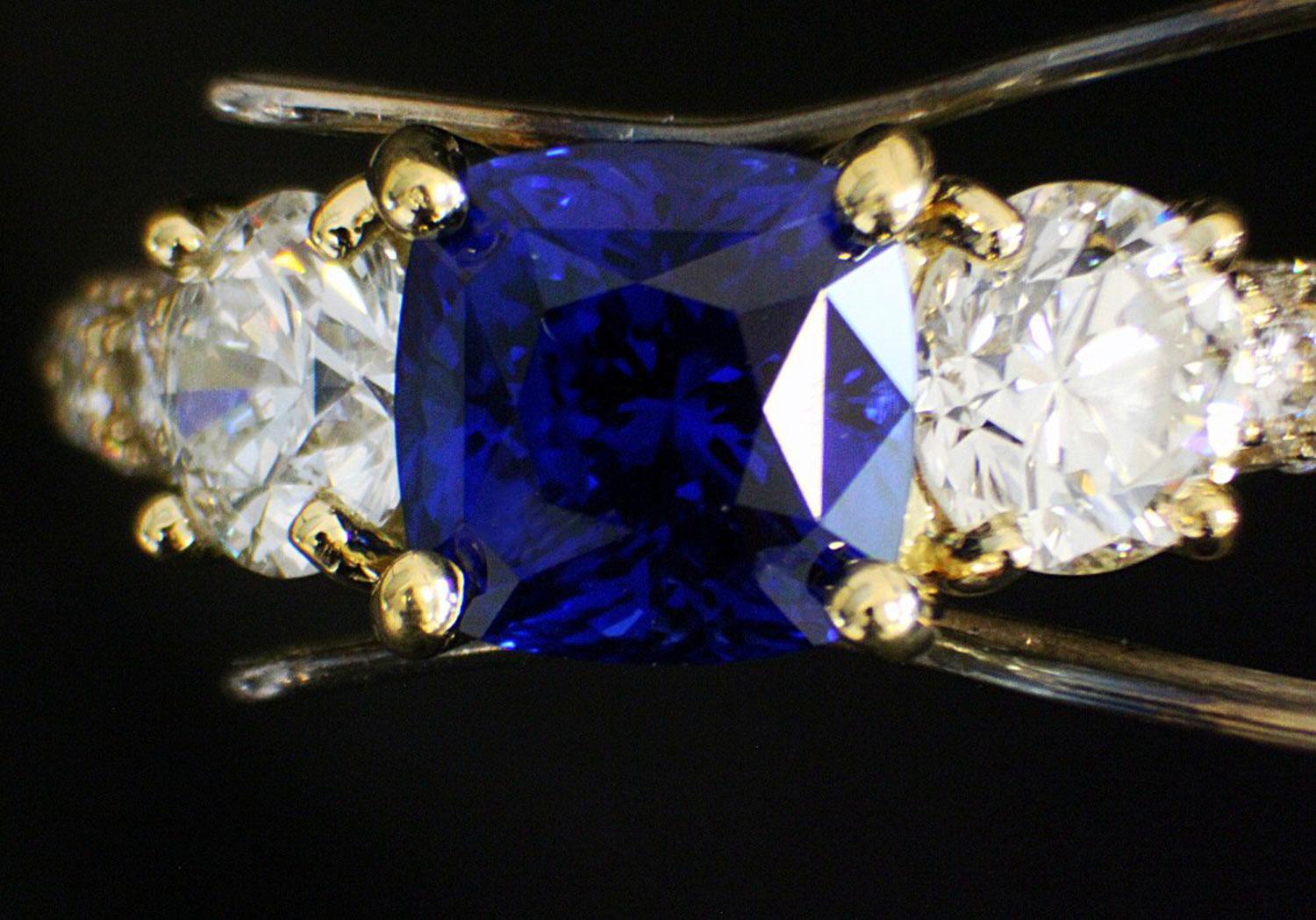 Sapphire Details:

Shape: Square Cushion

Carat Weight: 2.67 Carats

Color: Vivid Electric Royal Blue

Clarity: The light is scattered by the silky Kashmir like inclusions. VS, Very clean and crystal, not milky or foggy looking, 

no inclusions