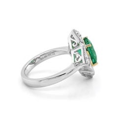 2.67 Carats Emerald and White Diamond White and Yellow Gold Ring