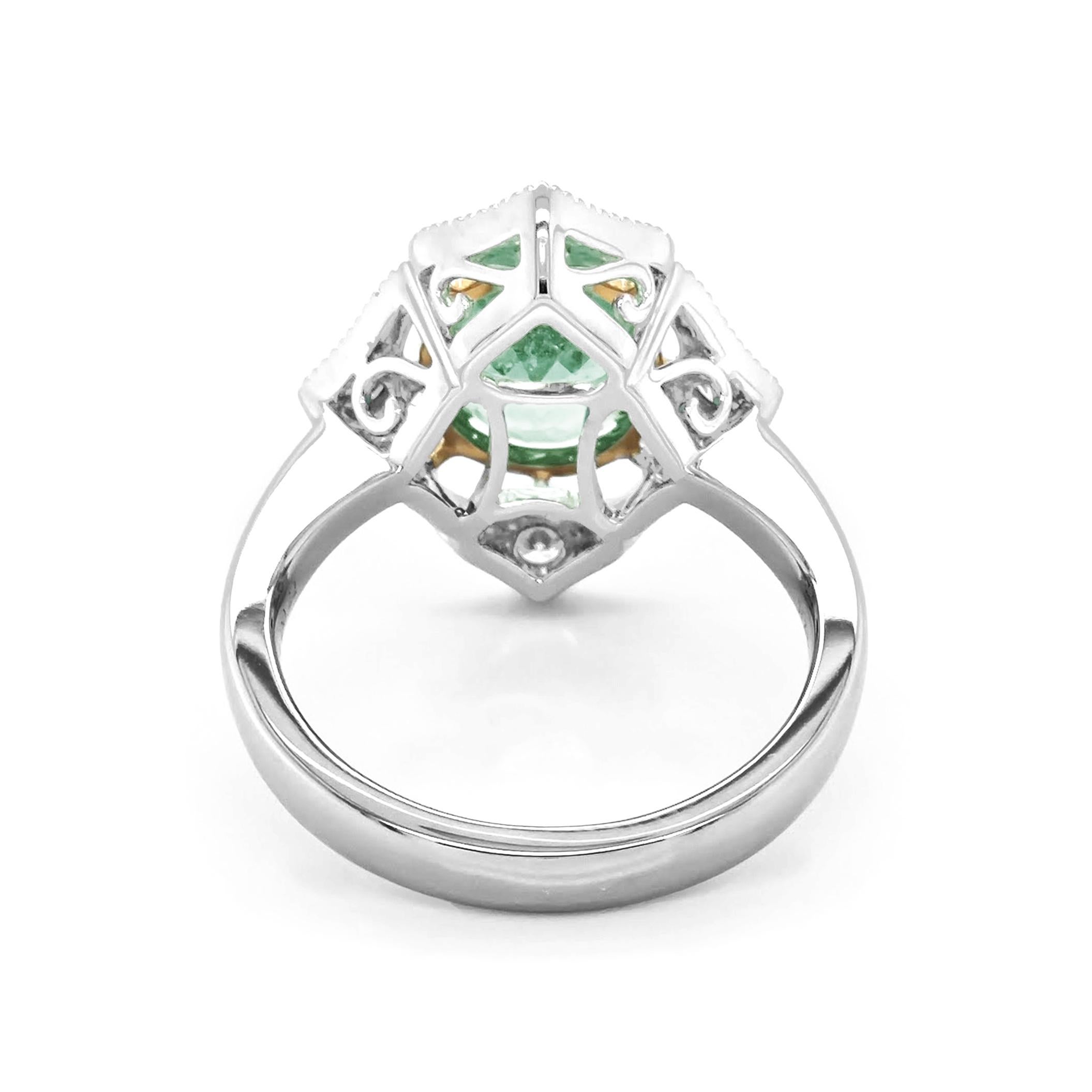 Oval Cut 2.67 Carats Emerald and White Diamond White and Yellow Gold Ring For Sale