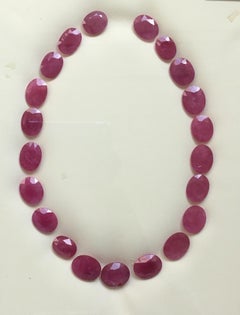 267.02 Carats Ruby Mozambique Oval Faceted Cut stone Layout Heated Natural Gem