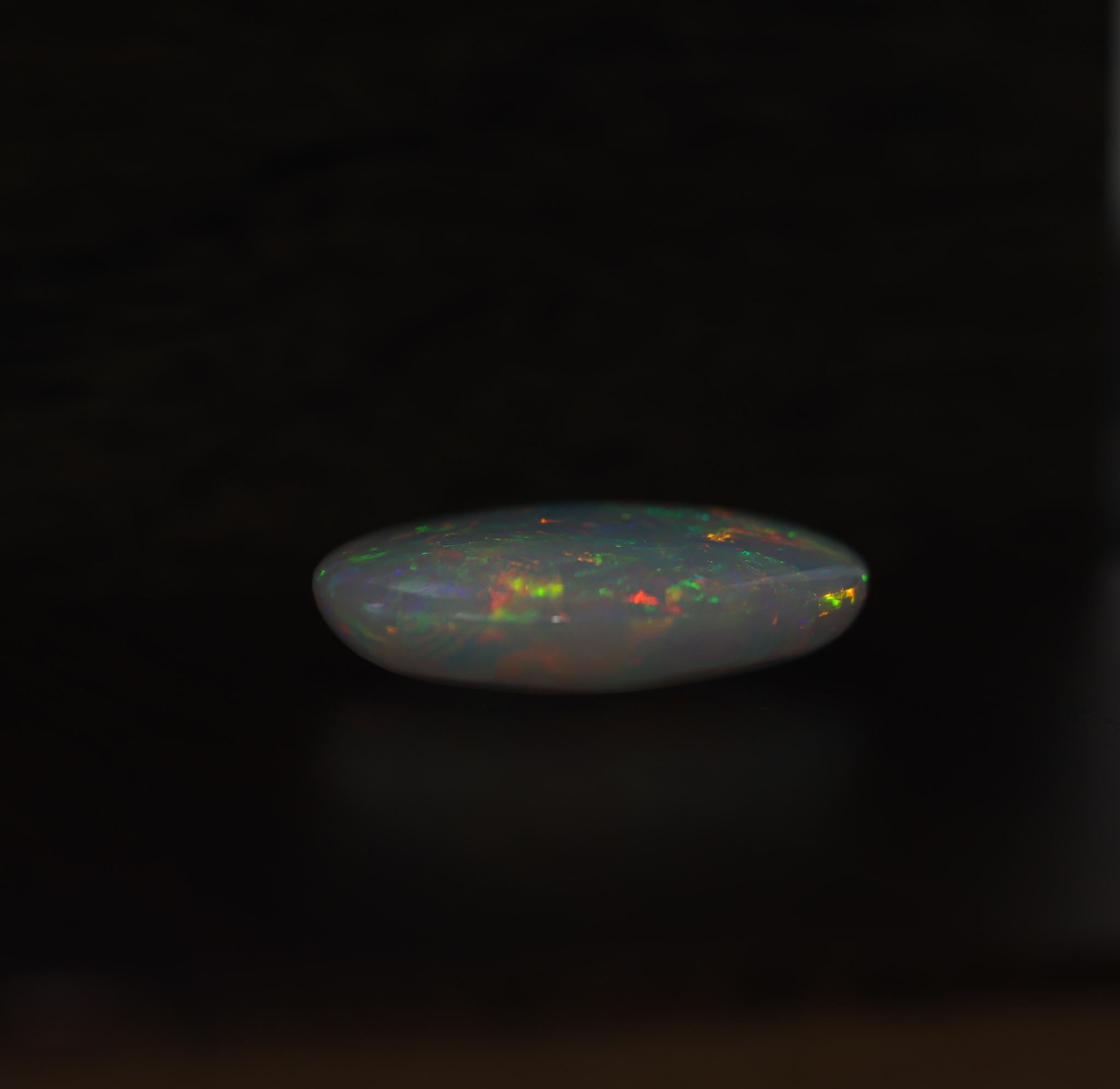 Oval Cut 26.72 Carat Ethiopian Opal Loose Gemstone Oval 29x24mm For Sale