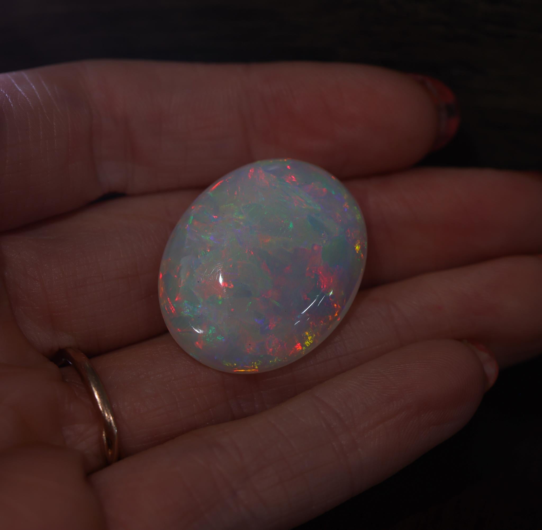 26.72 Carat Ethiopian Opal Loose Gemstone Oval 29x24mm In New Condition For Sale In Columbus, OH