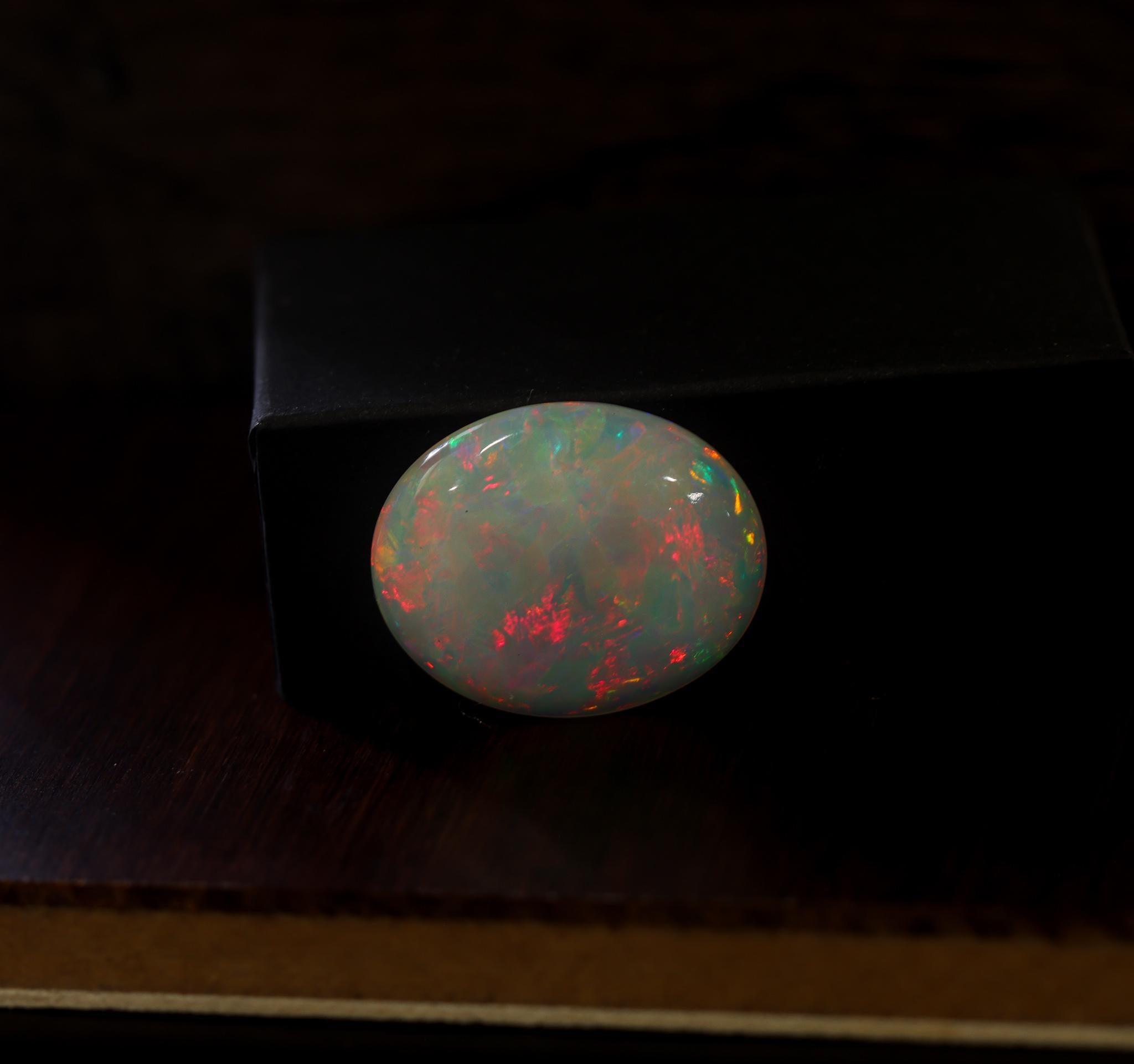 Women's 26.72 Carat Ethiopian Opal Loose Gemstone Oval 29x24mm For Sale