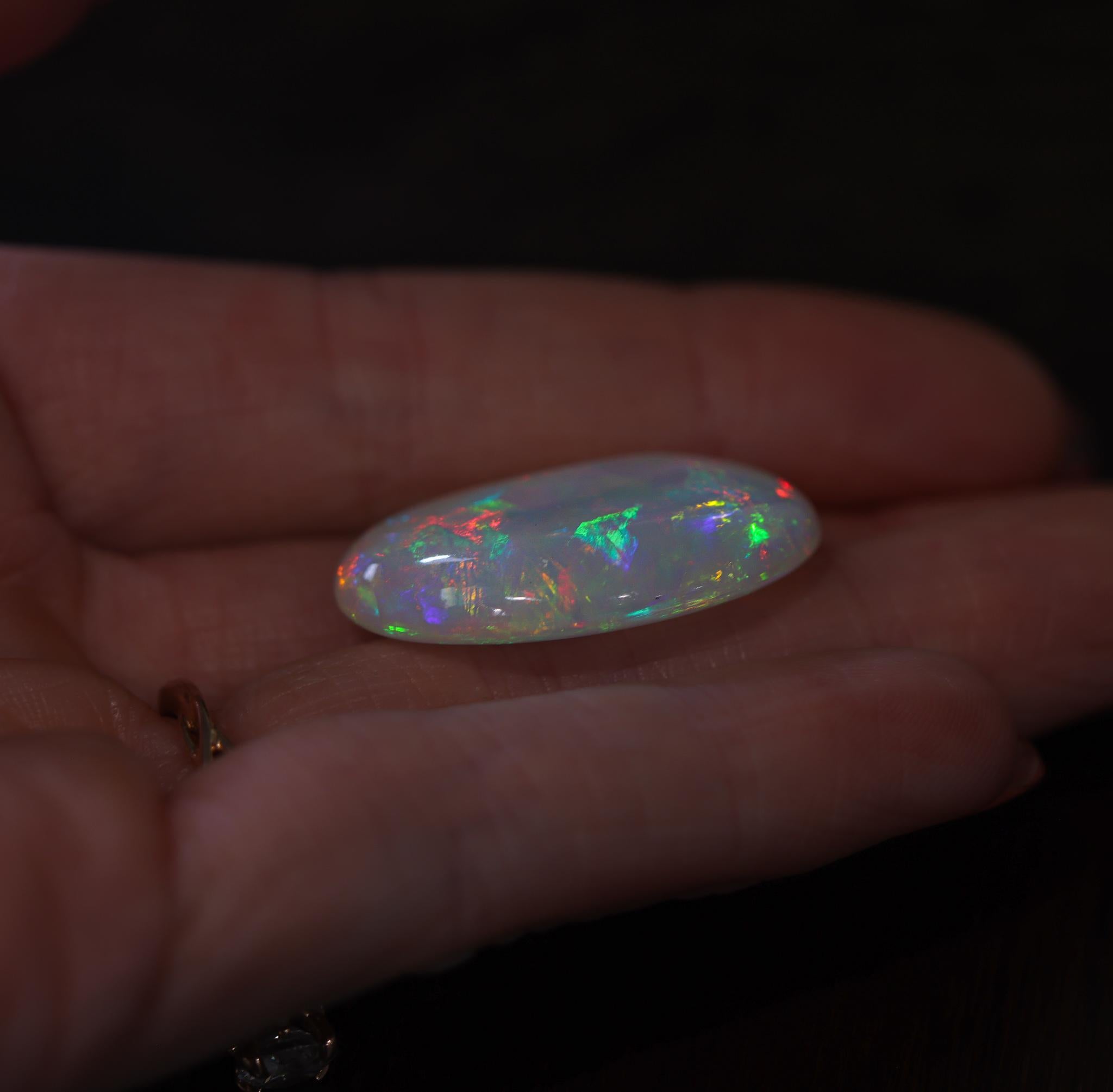 26.72 Carat Ethiopian Opal Loose Gemstone Oval 29x24mm For Sale 1