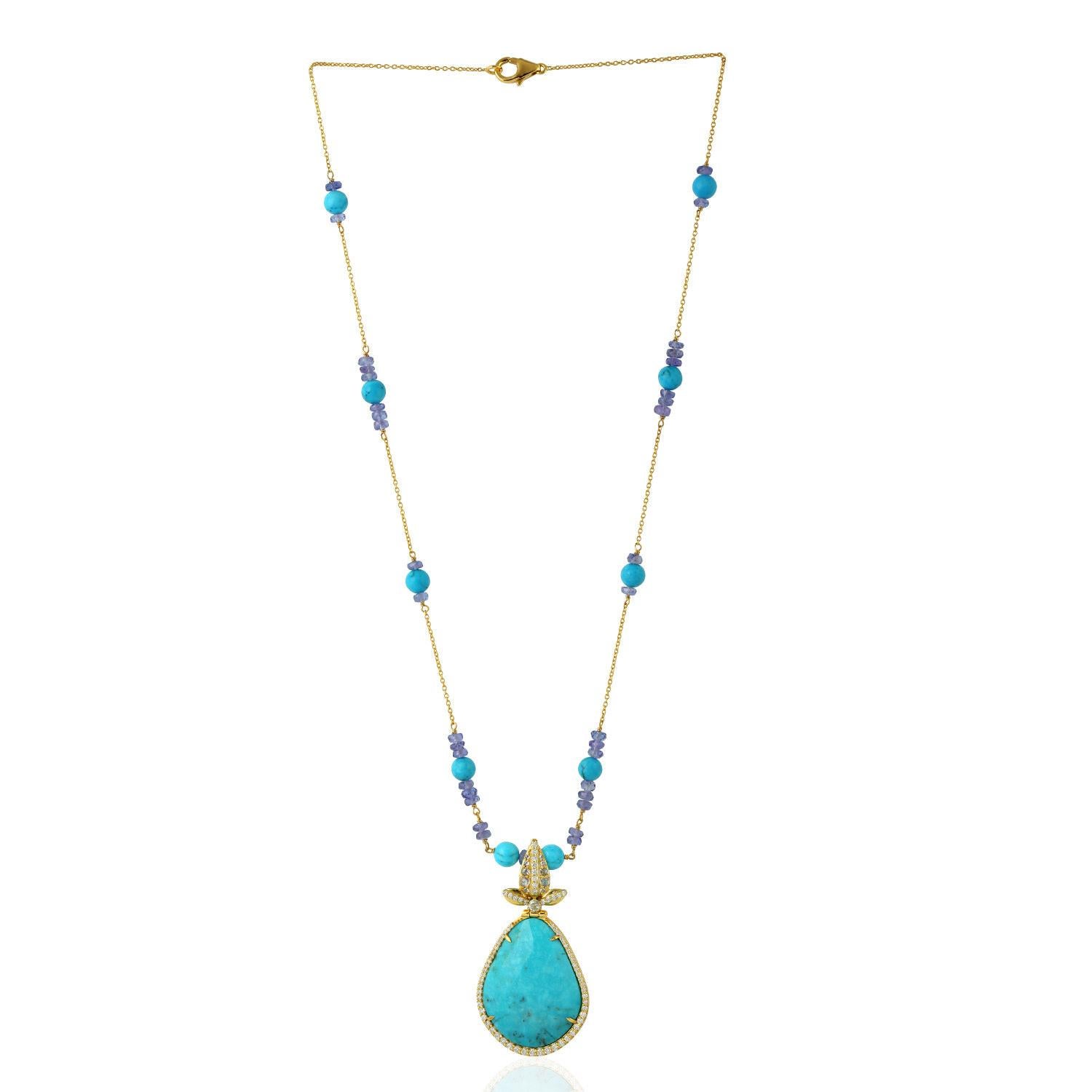 Handcrafted from 14-karat gold, these beautiful necklace is set with 26.72 carats Turquoise, 8.79 carat tanzanite and .78 carats of glimmering diamonds.

FOLLOW  MEGHNA JEWELS storefront to view the latest collection & exclusive pieces.  Meghna