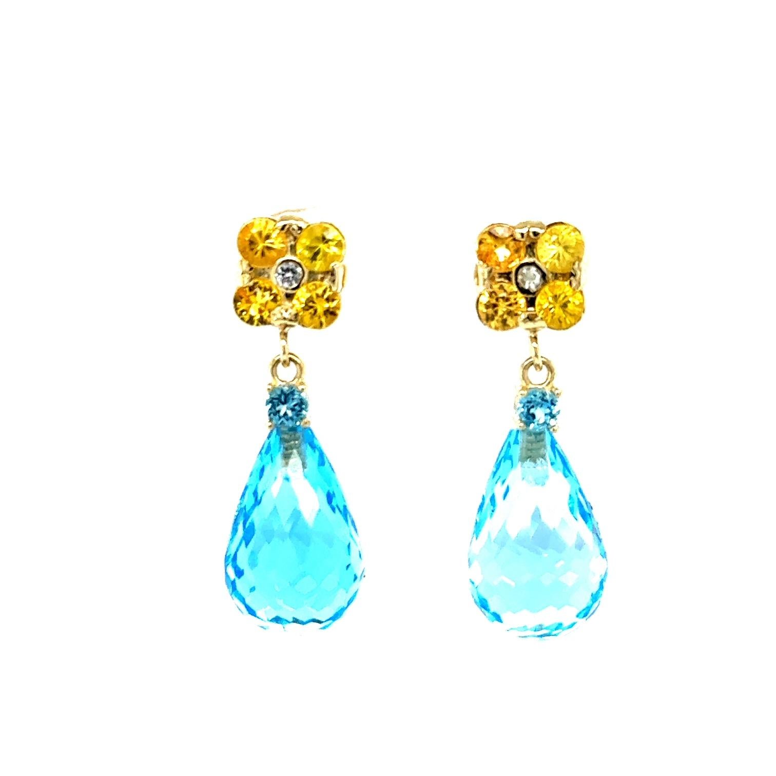 26.70 Carat Blue Topaz Yellow Sapphire Yellow Gold Drop Earrings

Item Specs:

2 Faceted Briolette Blue Topaz stones weighing approximately 24.80 carats
(Measurements of Blue Topaz Faceted Briolette 15mm x 10mm) 
8 Round Cut Yellow Sapphires