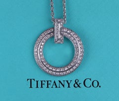 26749 Tiffany & Co 18k White Gold Pave Set Diamond T1 T Circle Pendant Necklace