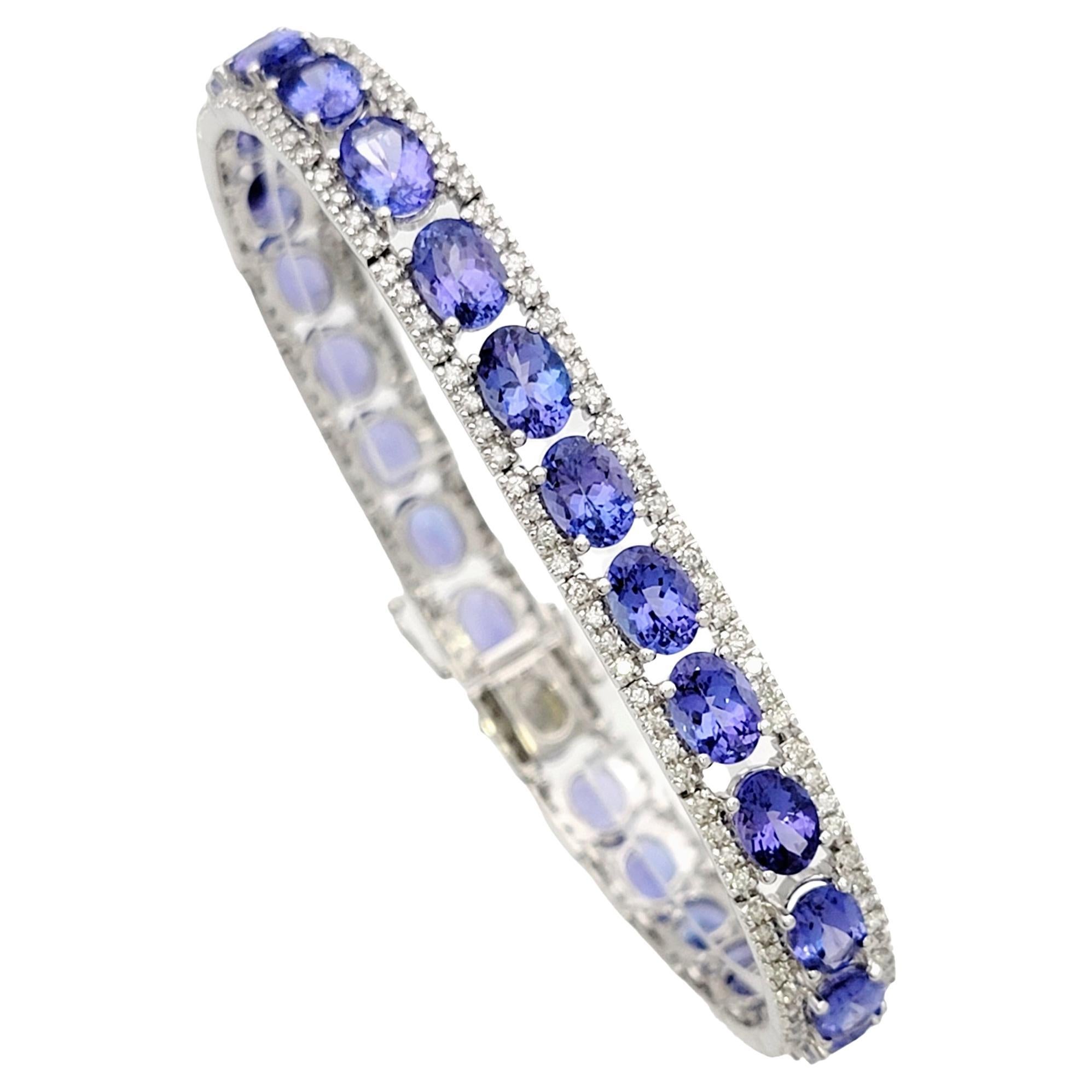 Length: 7.5 Inches

Shown here is an absolutely exquisite tanzanite and diamond line bracelet that embodies the utmost elegance and sophistication. This stunning bracelet is a testament to the timeless beauty of tanzanites, showcasing a stunning