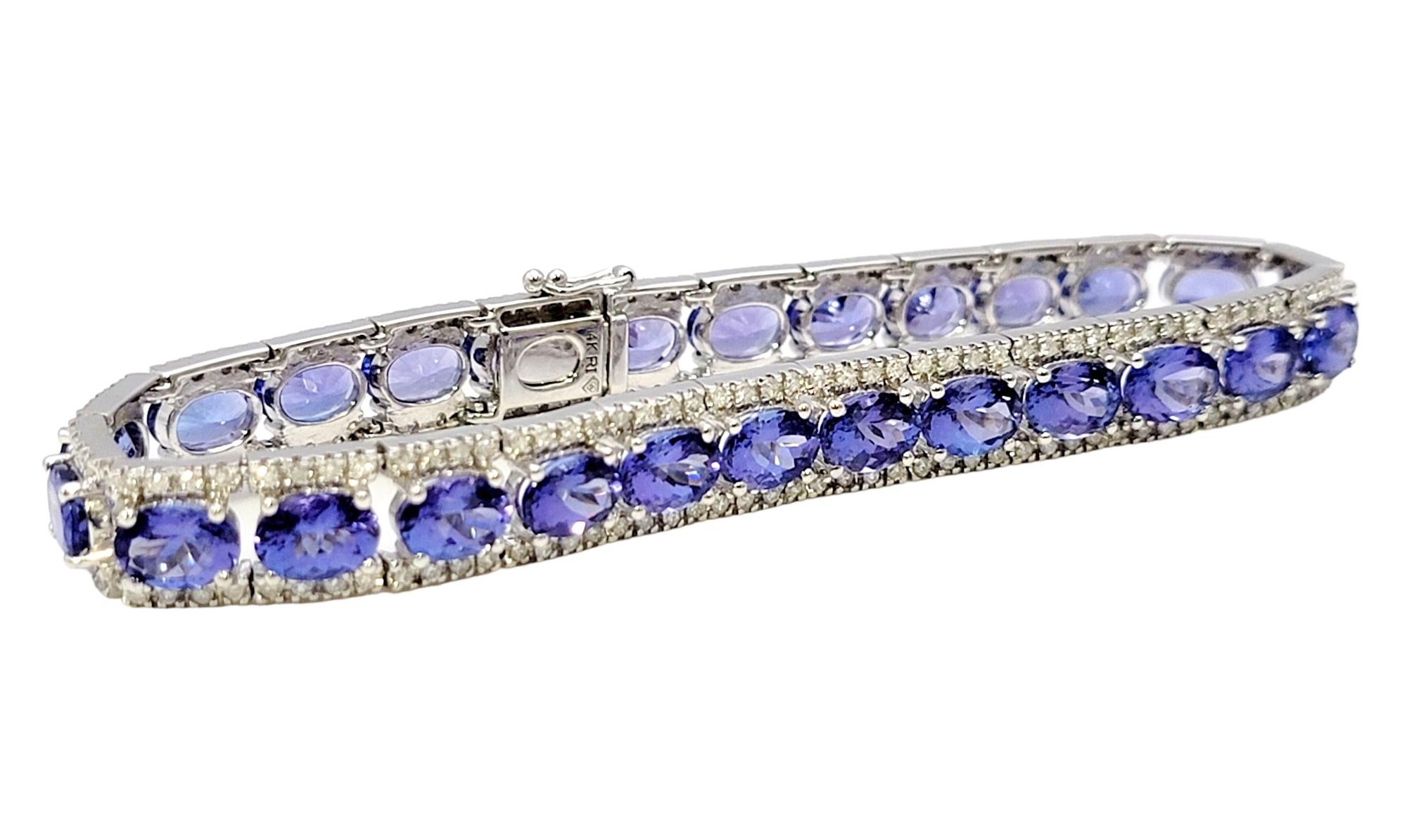 Oval Cut 26.75 Carat Total Oval Tanzanite and Pave Diamond Line Bracelet in White Gold For Sale