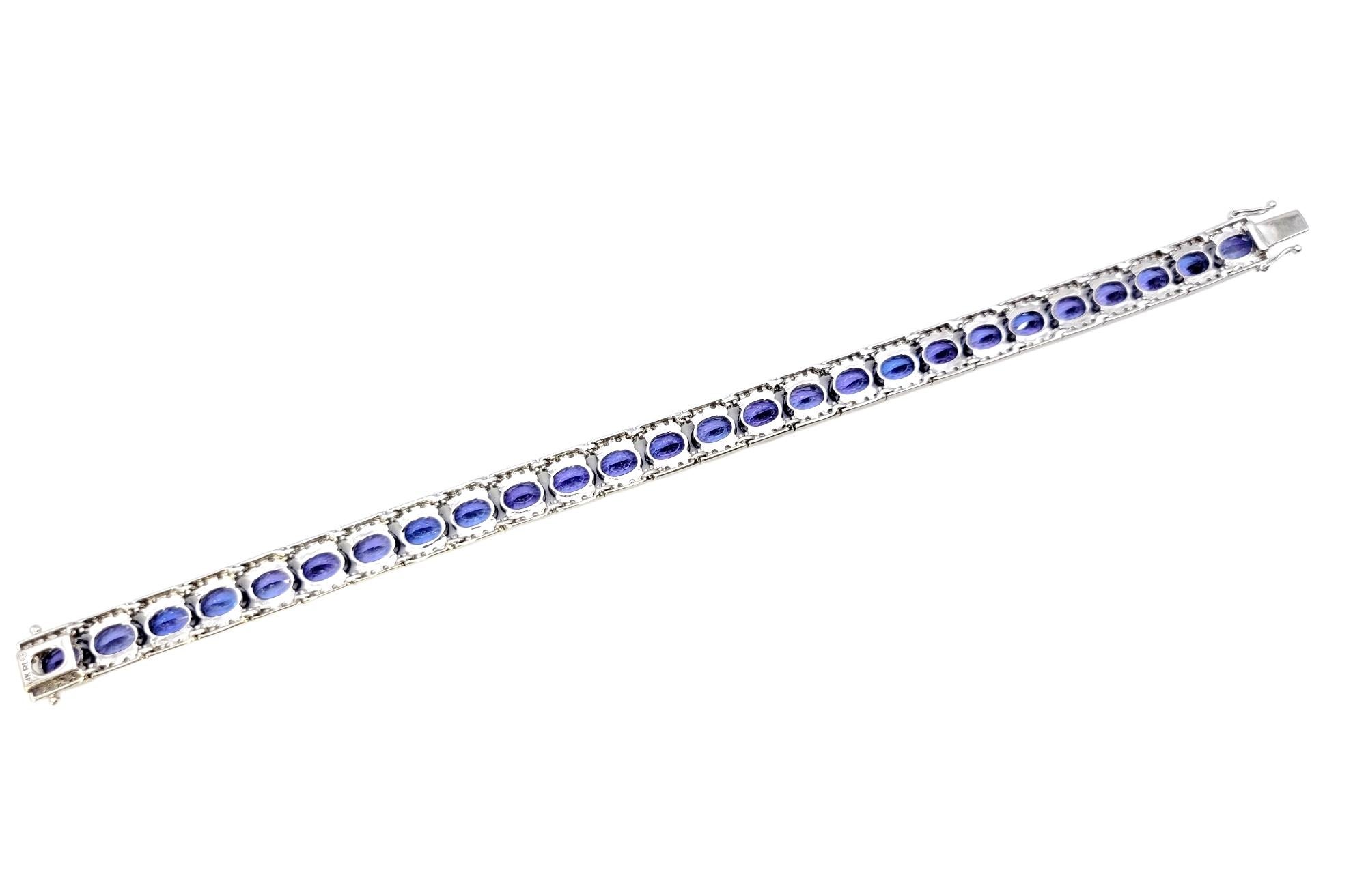 Women's 26.75 Carat Total Oval Tanzanite and Pave Diamond Line Bracelet in White Gold For Sale