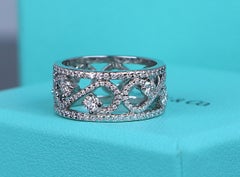 26776 Tiffany & Co Platinum Eternity Diamond 9.2mm Enchant Scroll Ring Band 7