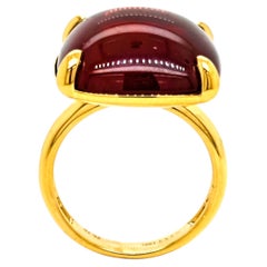 Anello in oro giallo con granato da 26,78 carati