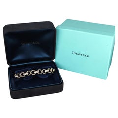 26787 Vintage Tiffany & Co 18k Gold Diamond Twisted Rope Infinity Bracelet 7.25"