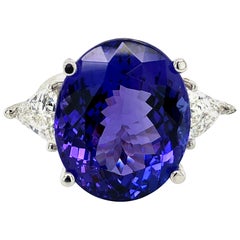 26.79 Carat Oval Tanzanite and Diamonds Ring 18 Karat