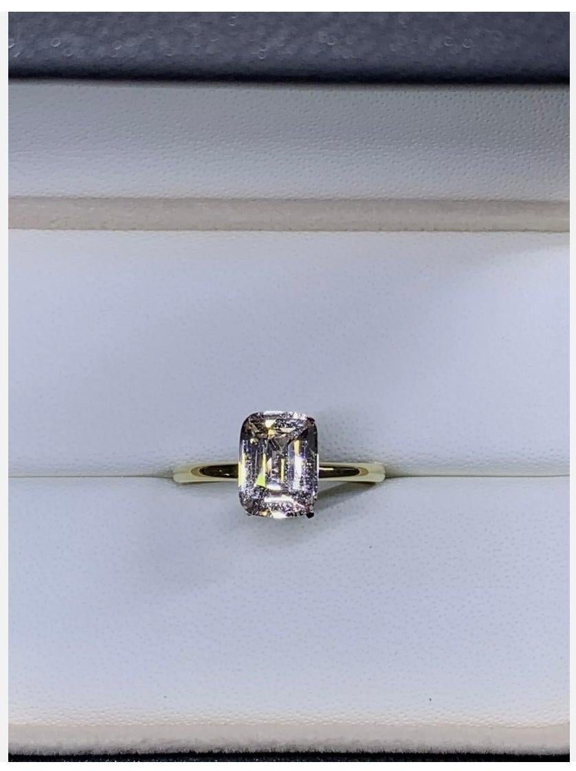 2.67ct Sapphire Emerald Solitaire Engagement Ring In 18ct Yellow Gold
This stunning 2.67 carat solitaire engagement ring features a beautiful natural emerald cut sapphire in a classic 18ct yellow gold setting. The sapphire is complemented by a