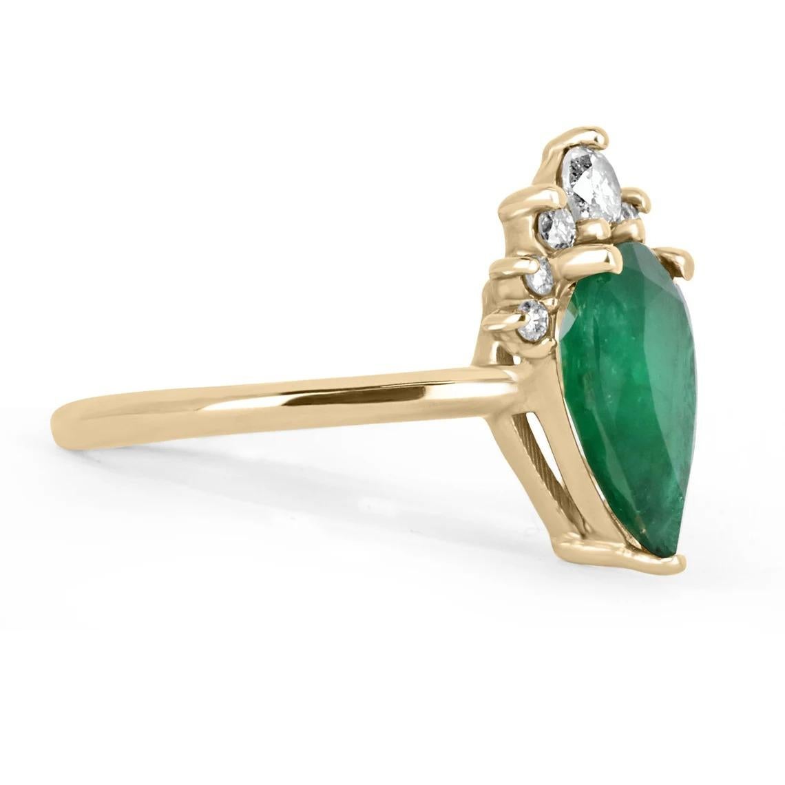 The perfect, tiara emerald & diamond engagement ring, a right-hand ring, or just for everyday wear! This gorgeous piece is sure to get all the right attention! The 2.35ct pear-shaped emerald is nestled in numerous golden prongs. Minor Jardins exist