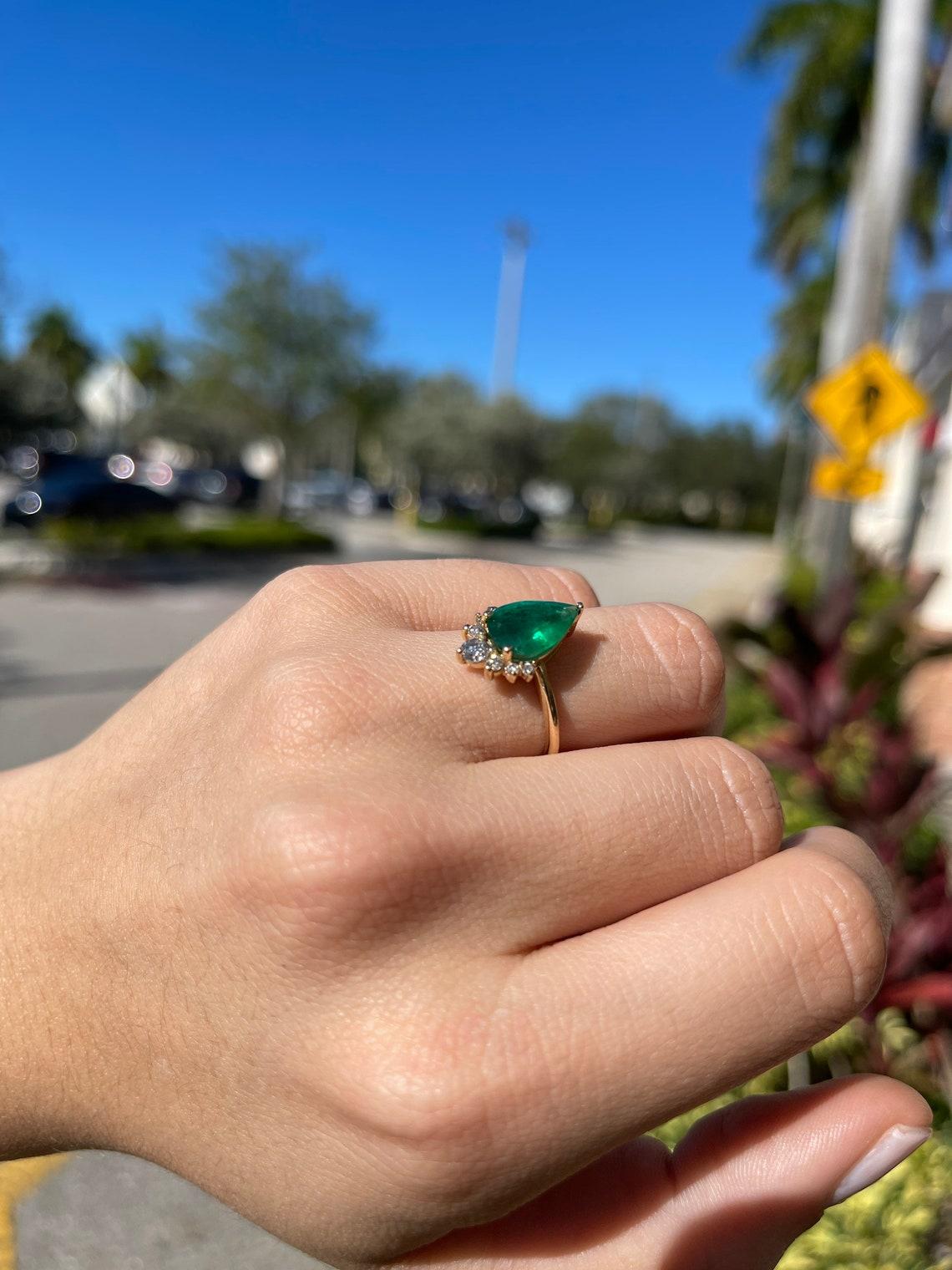 emerald pear cut engagement ring