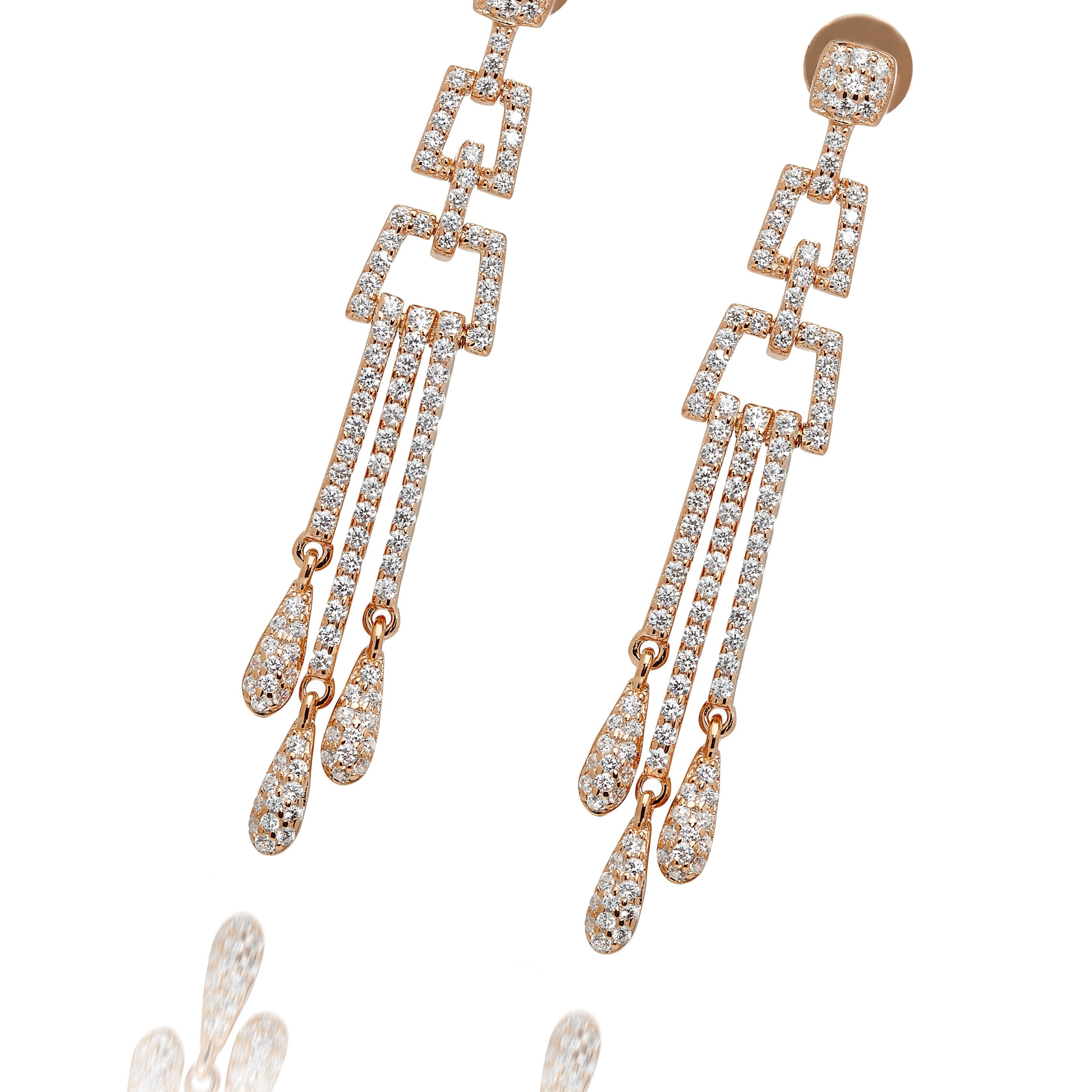 Art Deco Style Sterling Silver Hand Finished 2.6 Carat Cubic Zirconia 14 Karat Rose Gold Plated Chandelier Drop Earrings

Inspired by the geometric designs favoured in the Art Deco period, this stunning pair of earrings will transport you to another