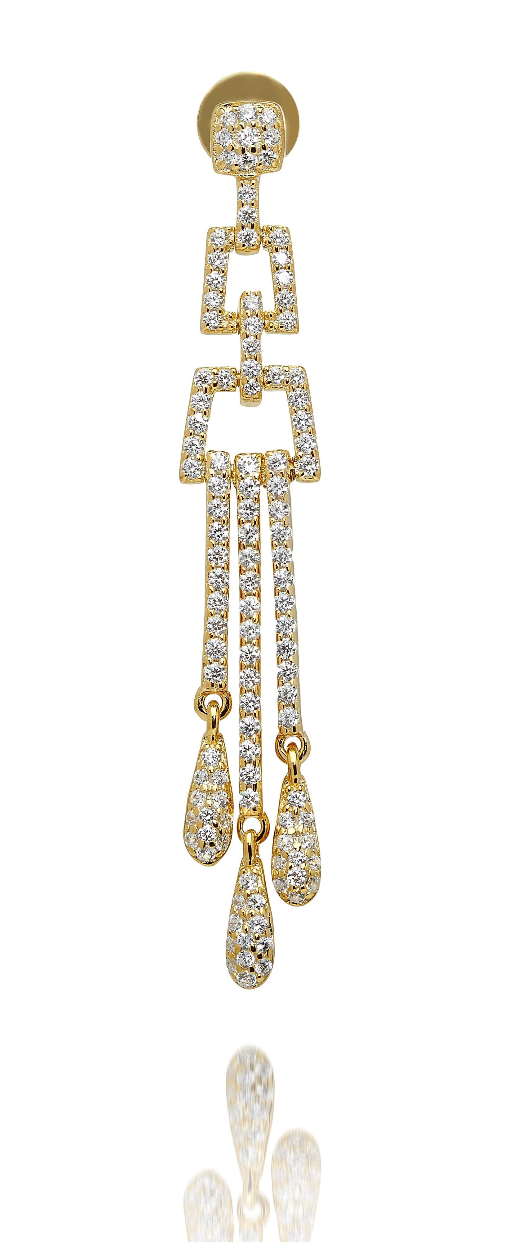 Art Deco Style Sterling Silver Hand Finished 2.6 Carat Cubic Zirconia 14 Karat Yellow Gold Plated Chandelier Drop Earrings

Inspired by the geometric designs favoured in the Art Deco period, this stunning pair of earrings will transport you to