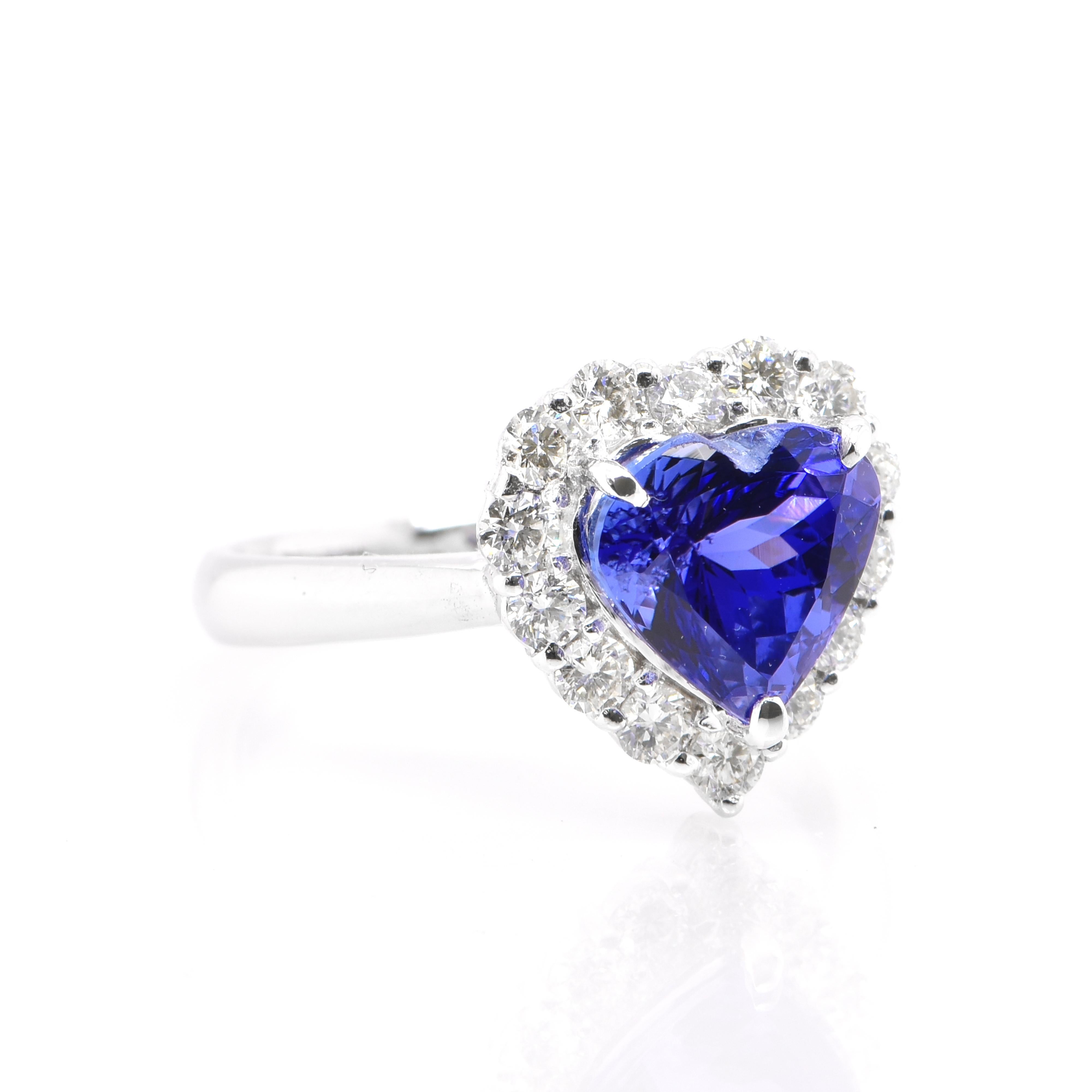 Modern 2.68 Carat, Natural, Heart-Shape Tanzanite and Diamond Halo Ring Set in Platinum